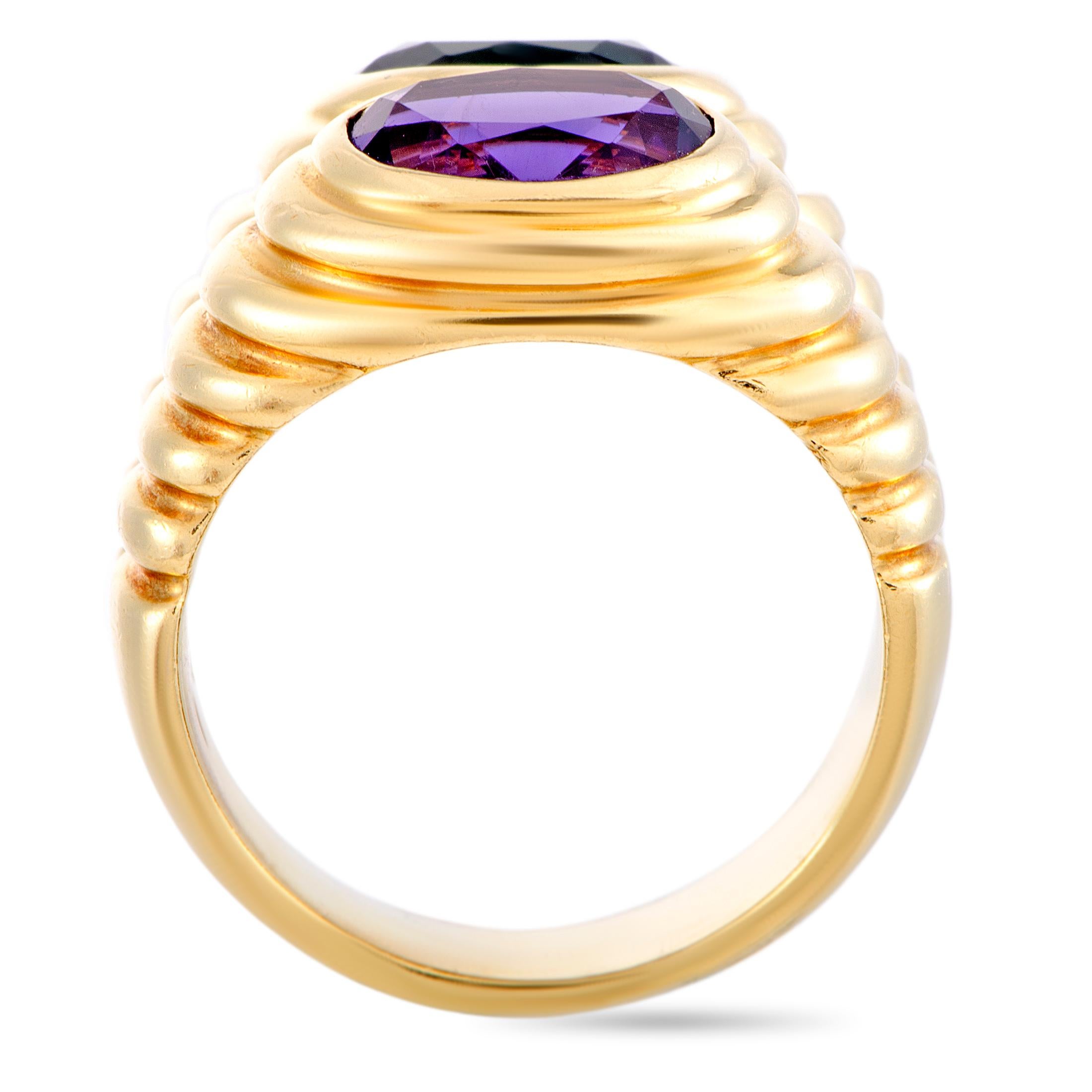 The Bvlgari “Doppio” ring is crafted from 18K yellow gold and set with an amethyst and a tourmaline. The ring weighs 15.2 grams, boasting band thickness of 5 mm and top height of 5 mm, while top dimensions measure 15 by 10 mm.

This jewelry piece is