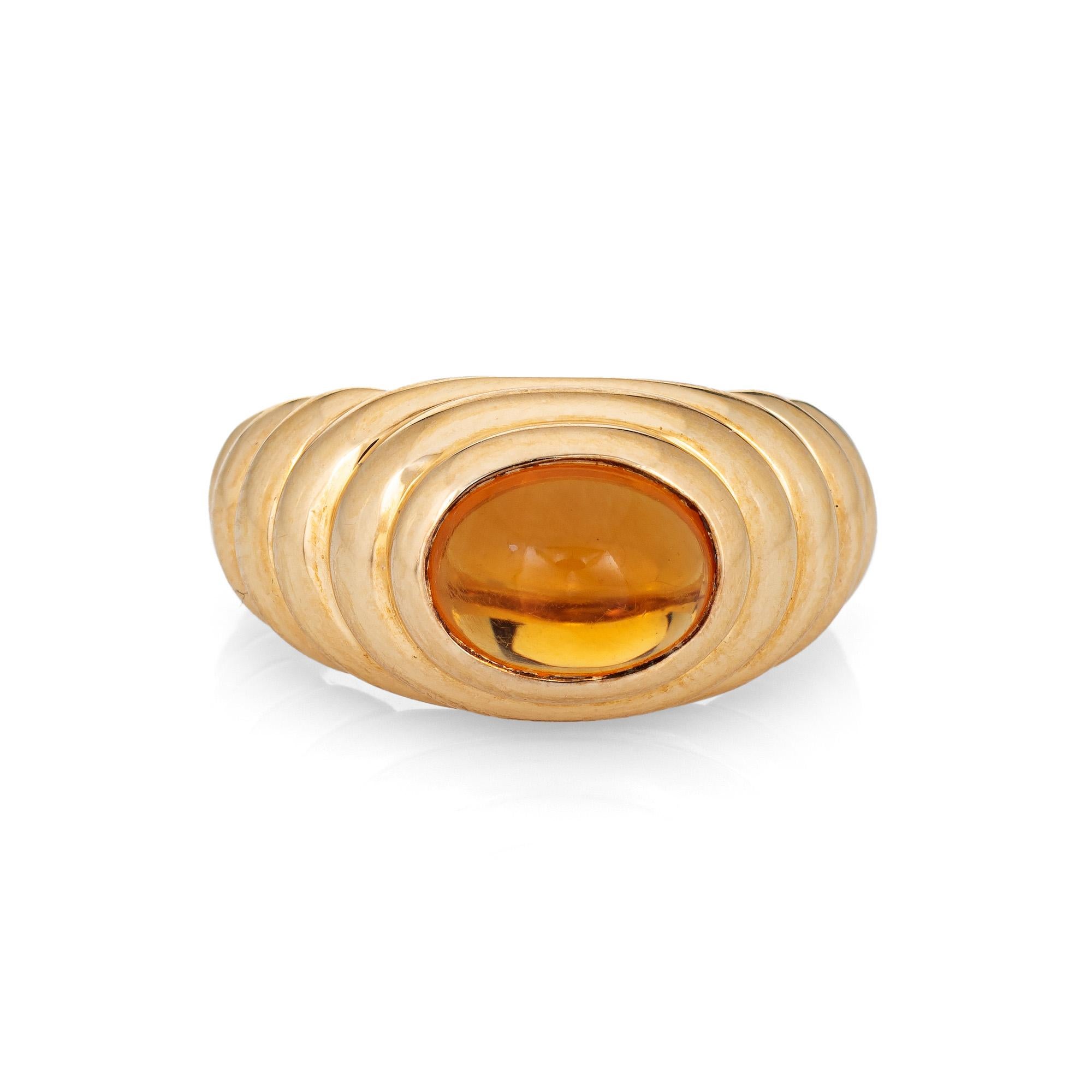 Pre-owned Bulgari citrine 'Doppio' ring crafted in 18k yellow gold (circa 1980s).

Cabochon cut citrine measures 9mm x 6.5mm (estimated at 2 carats). The citrine is in very good condition and free of cracks or chips.

The beautifully designed ring