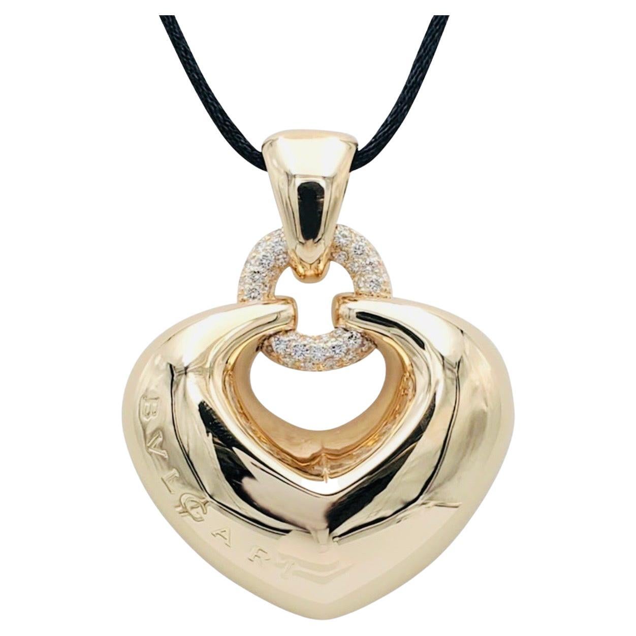 Bulgari 'Doppio Cuore' Gold and Diamond Puffed Heart Pendant on the Leather  Cord For Sale at 1stDibs