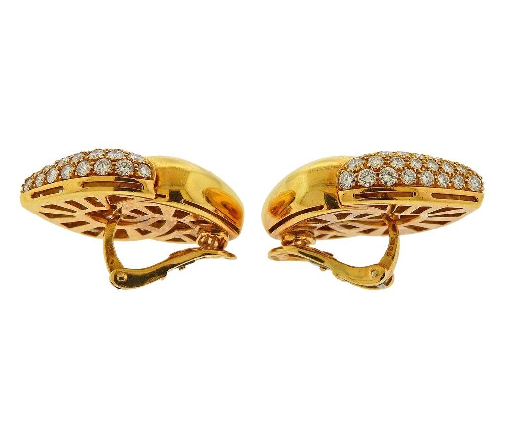 Pair of 18k yellow gold Doppio Cuore earrings, set with approx. 5.50ctw in G/VS diamonds. Earrings are 30mm x 24mm. Weight is 37.1 grams. Marked Bvlgari, 750, 2337AL.