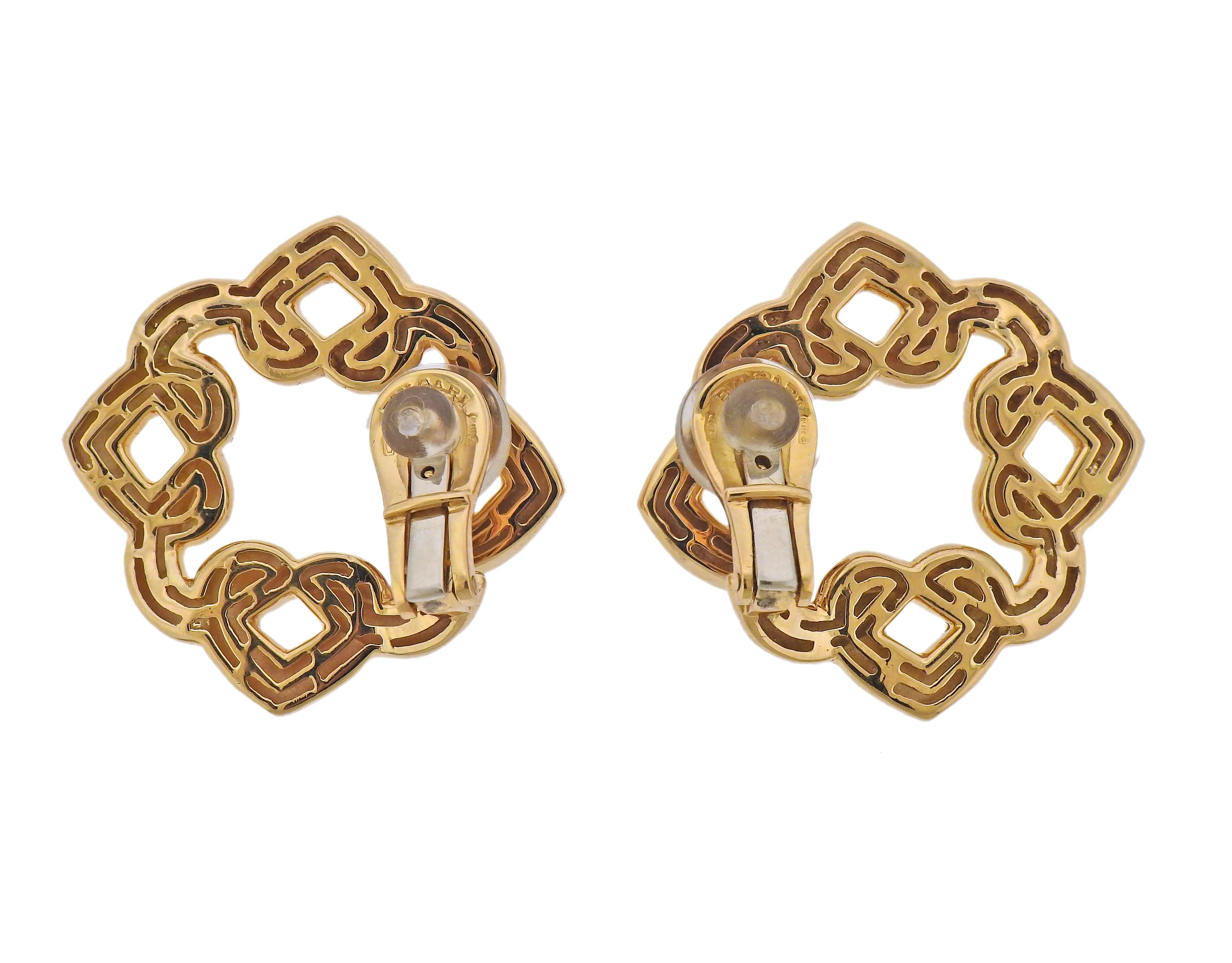 Pair of 18k yellow gold Bvlgari Doppio Cuore earrings. Measuring 26mm x 26mm. Marked: Bvlgari, 750, Italian mark. Weight - 18.2 grams.