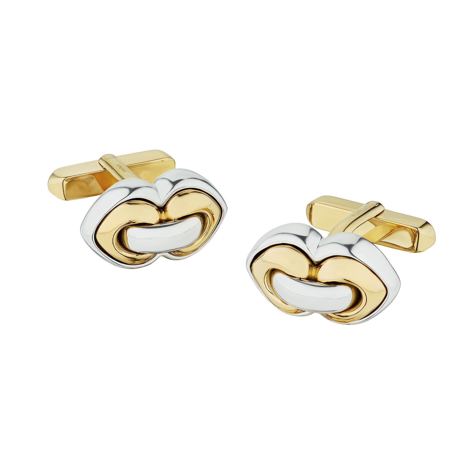Whether worn by a woman or a man, these chic Bulgari Modernist bi-colored gold cufflinks are irresistible.  Easily coordinated with other gold, platinum, or silver accessories, these rare and collectible cufflinks work 24/7.  Signed Bulgari.  Circa