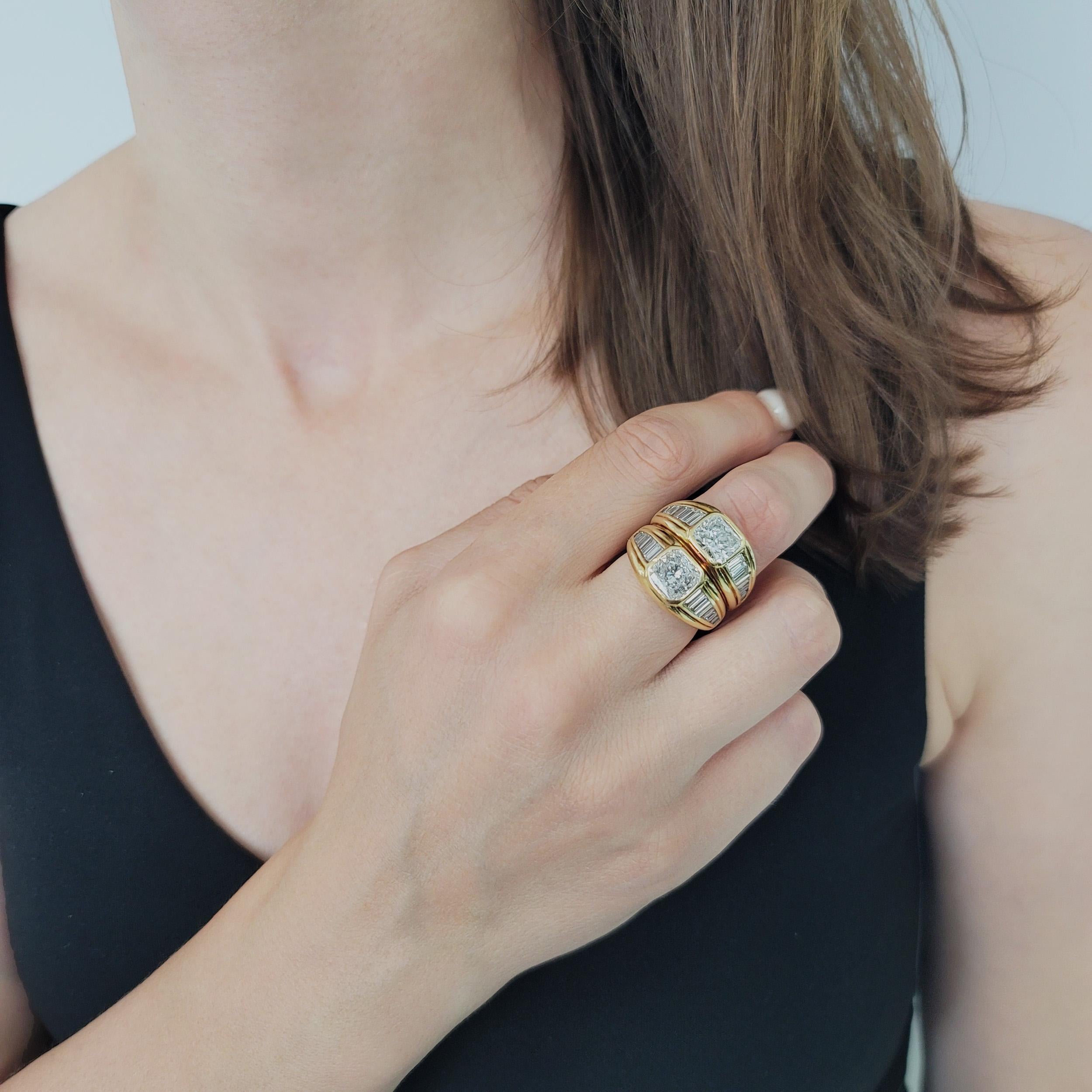 Anello Bulgari con doppio diamante in oro giallo 18 carati. Il
L'anello presenta un motivo a doppio anello, con castone centrale incastonato con due diamanti taglio cuscino del peso di 2,01ct e 2,01ct, colore G-H, purezza VS.
Il gambo è incastonato