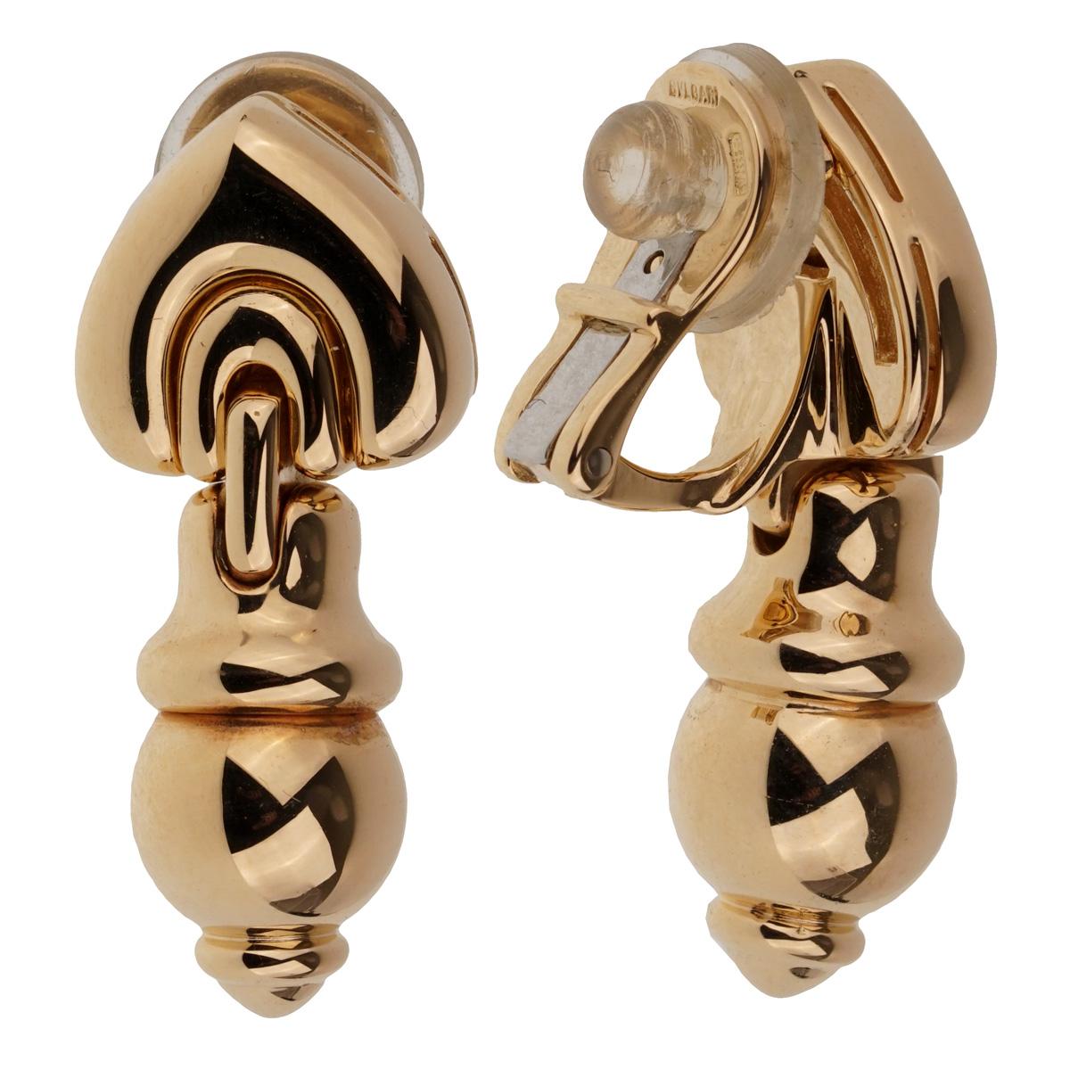 A fabulous pair of vintage Bulgari drop clip-on earrings crafted in 18k yellow gold. The earrings measure 1