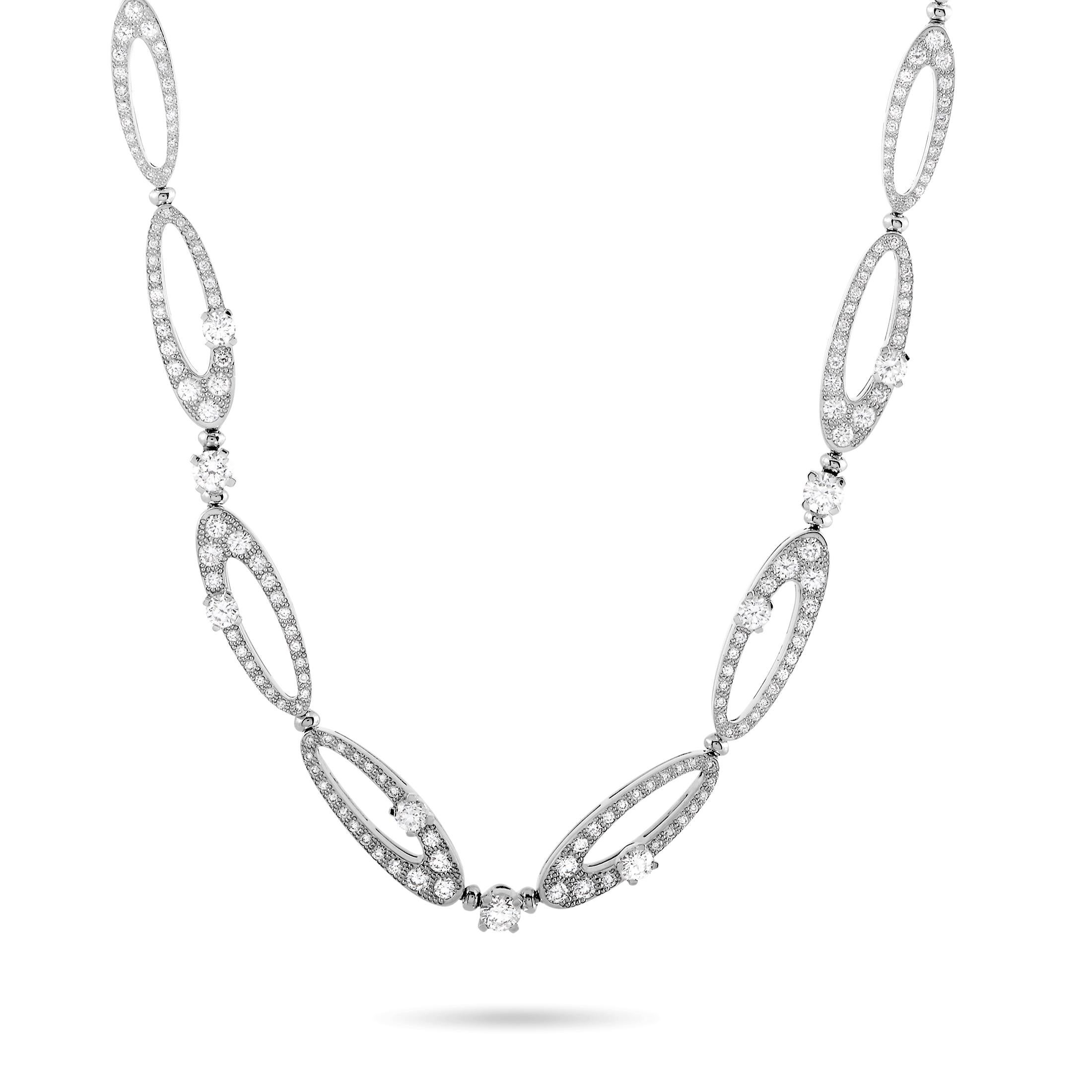The “Elisia” set by Bvlgari includes a necklace, a pair of earrings, and a ring that are crafted from 18K white gold and set with diamonds.

The necklace weighs 38.7 grams, measures 18.00” in length, and boasts a total of approximately 6.50 carats