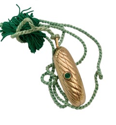 Bulgari Portapillole in oro giallo 18 carati e smeraldo