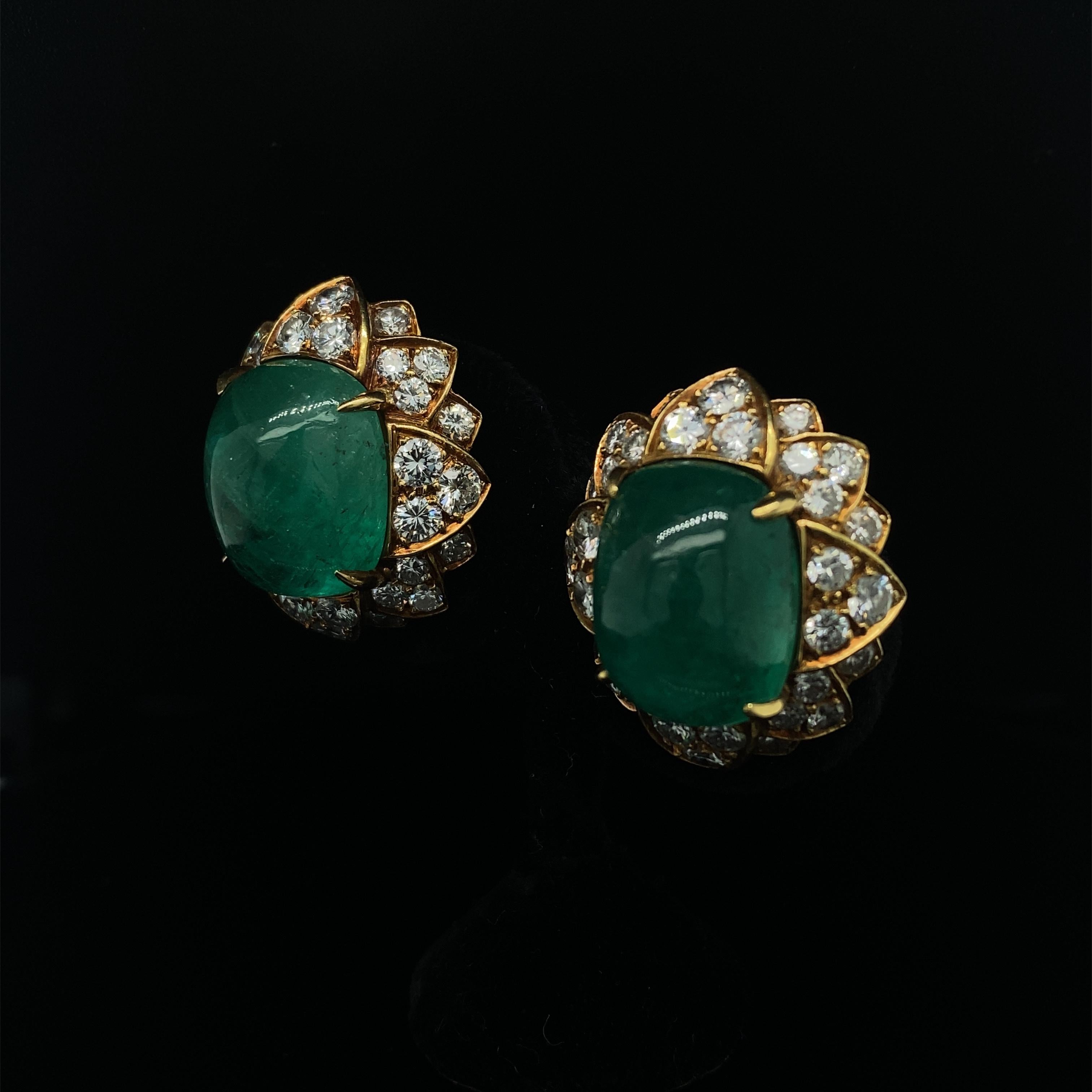 Bulgari emerald and diamond earrings 18kt yellow gold

An impressive pair of vintage emerald and diamond set cluster earrings, by Bulgari each cluster is set with a deep hued, lively cabochon emerald and petal style grain set round brilliant cut