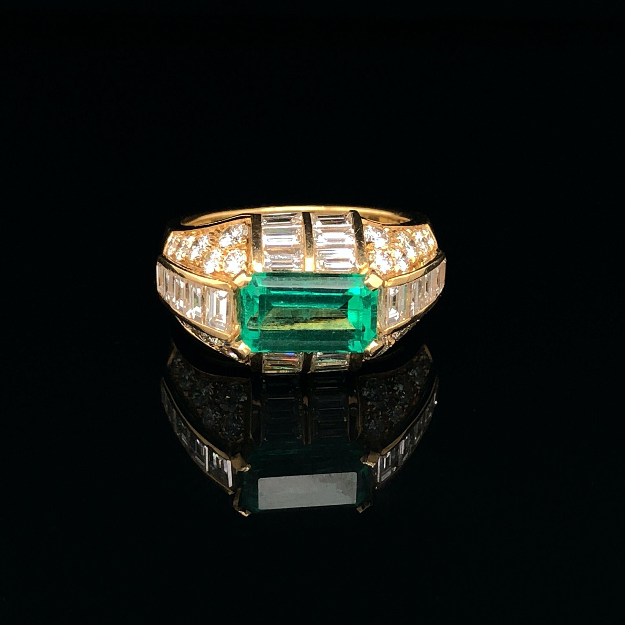 An emerald and diamond ring in yellow gold by Bulgari, ca. 1970s. The Trombino is a very popular and iconic ring model by Bulgari. The ring has a very smart and luxurious design, emphasising the centre gemstone, with the diamonds set in a manner