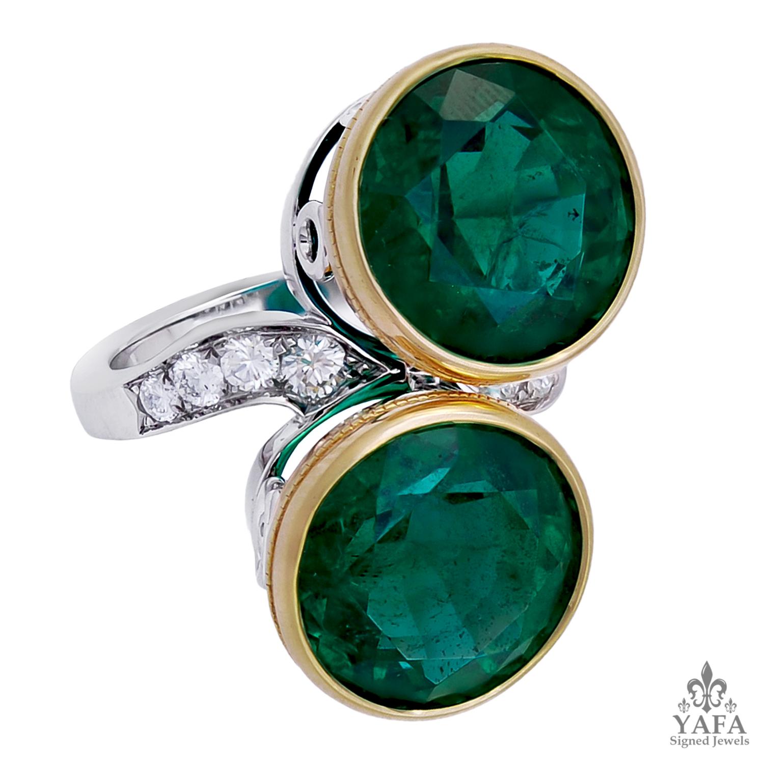 Bulgari  Rome Vintage Twin Emerald  Diamond Lovers Ring
An 18Kk yellow gold and platinum bypass ring, set with two round emerald and diamonds, signed Bulgari.
emerald weights are 8.27 cts and 8.34 cts.
ring size 6.5
signed “BVLGARI“; circa 1980s