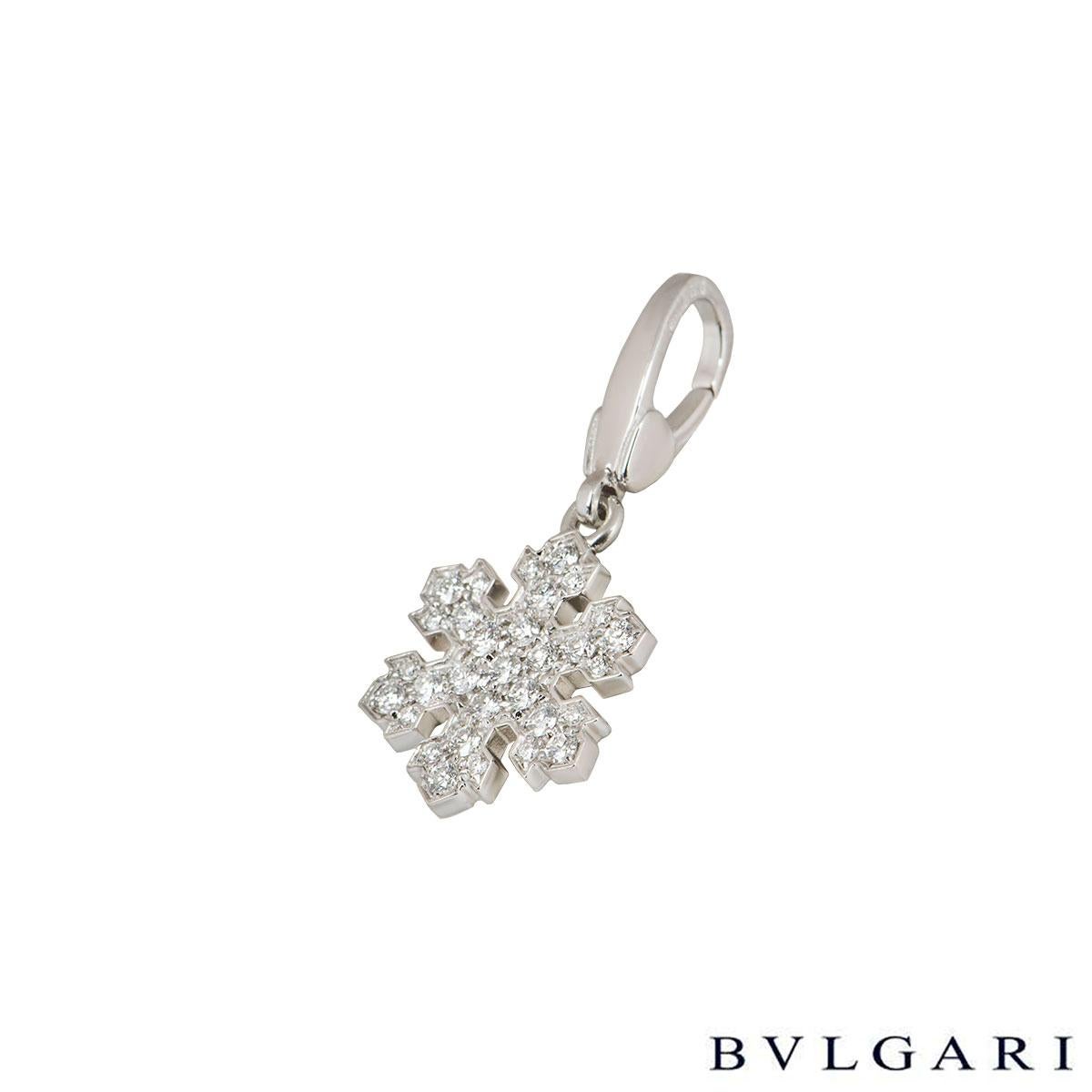 An 18k white gold diamond snowflake pendant by Bvlgari from the Fiocco De Neve collection. The pendant is a snowflake design and is pave set with 31 round brilliant cut diamonds with an approximate weight of 0.62ct. The pendant features a loop bail