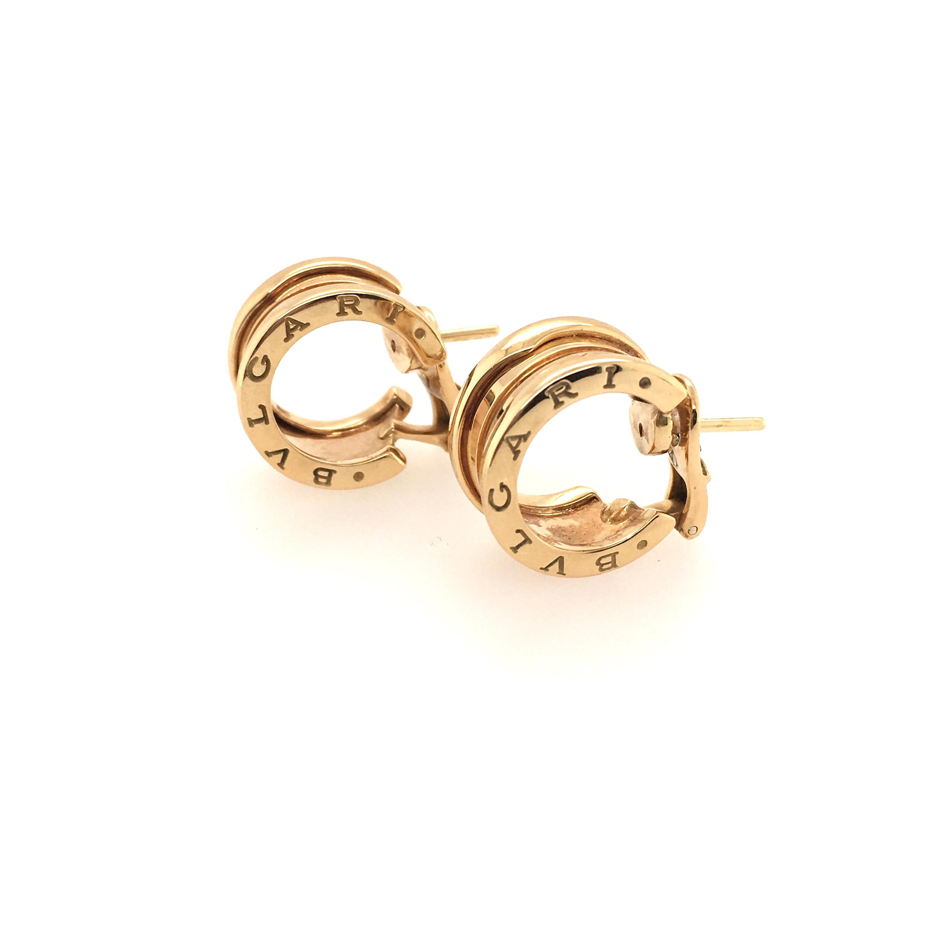 A pair of 18 karat yellow gold B Zero-1 Wide Hoop earrings. Bulgari. Designed as a polished gold hoop. Width is approximately 9mm, diameter is approximately 1/2 inch, gross weight is approximately 15.4 grams. Stamped Bulgari, with Italian assay mark