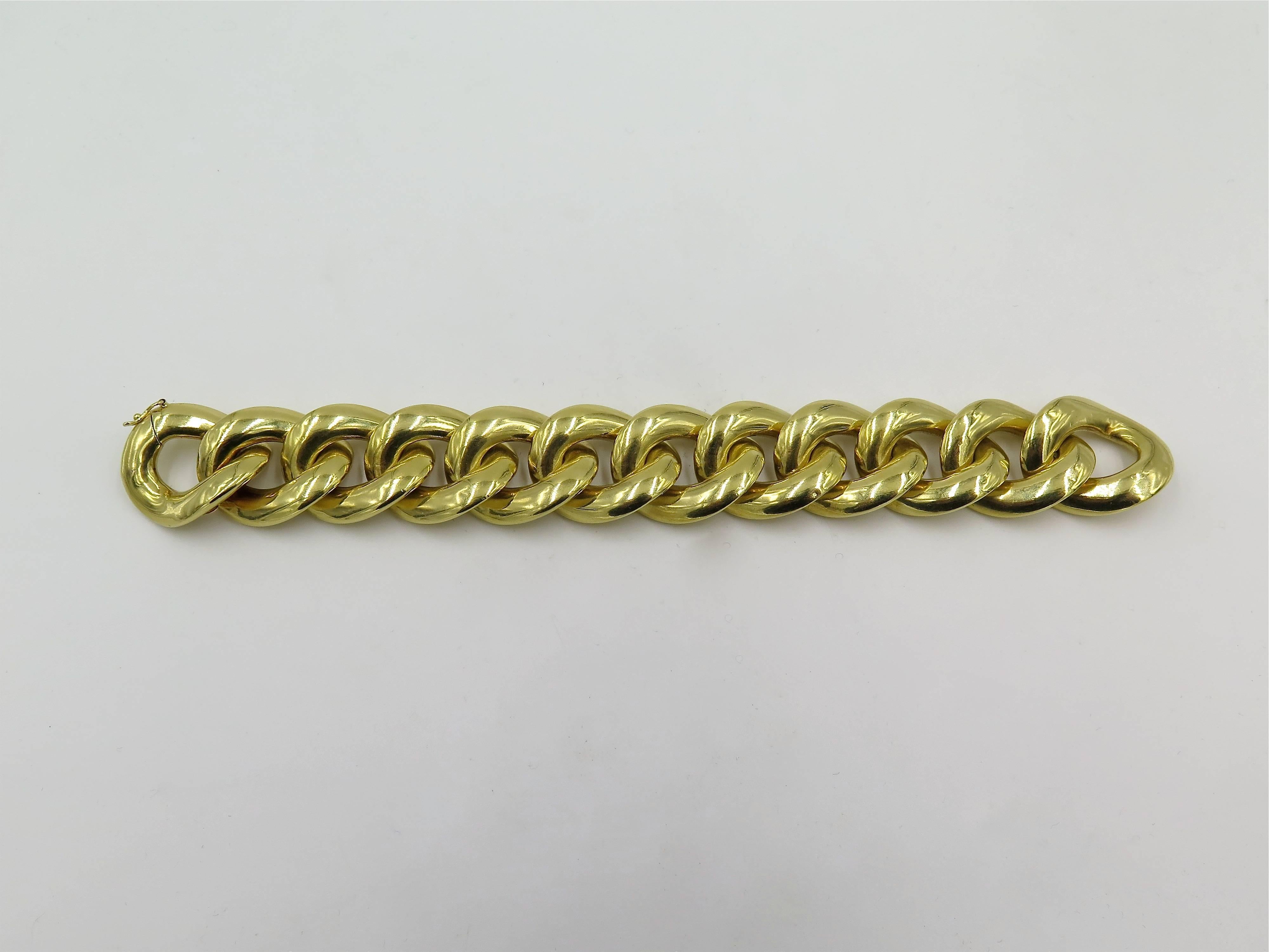 An 18 karat yellow gold bracelet. Bulgari. Of polished curb link design. Width is approximately 1 inch, length is approximately 7 1/2 inches, gross weight is approximately 77.9 grams. 