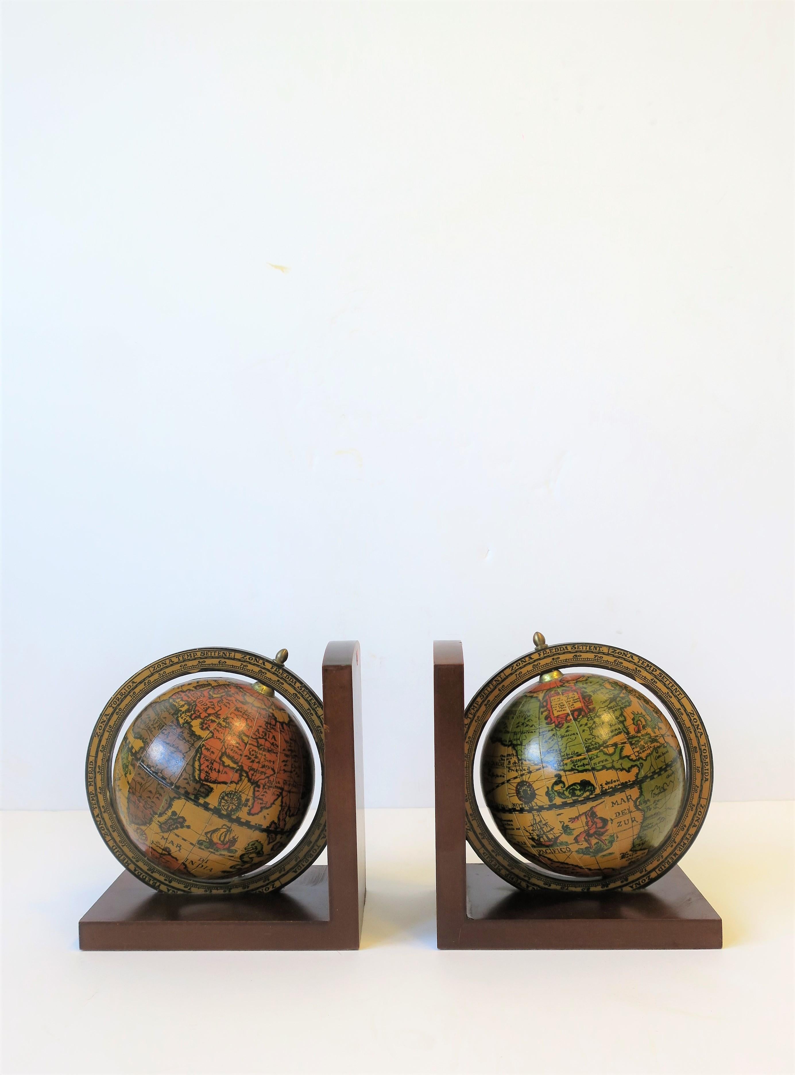 A midcentury pair of Italian world globe bookends with brass accents.
Marked 