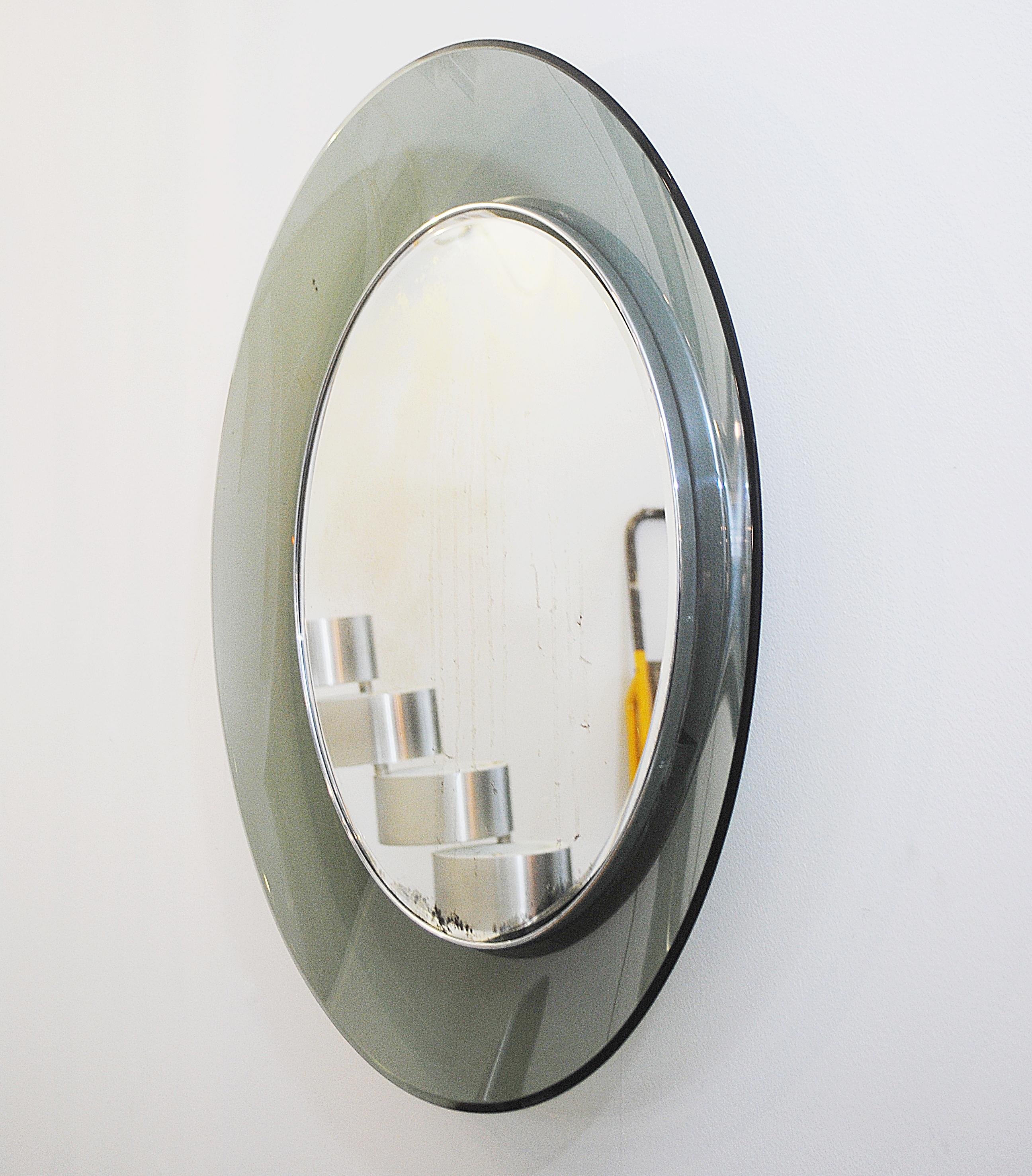 Round mirror by Fontana Arte, Italy, 1970s.