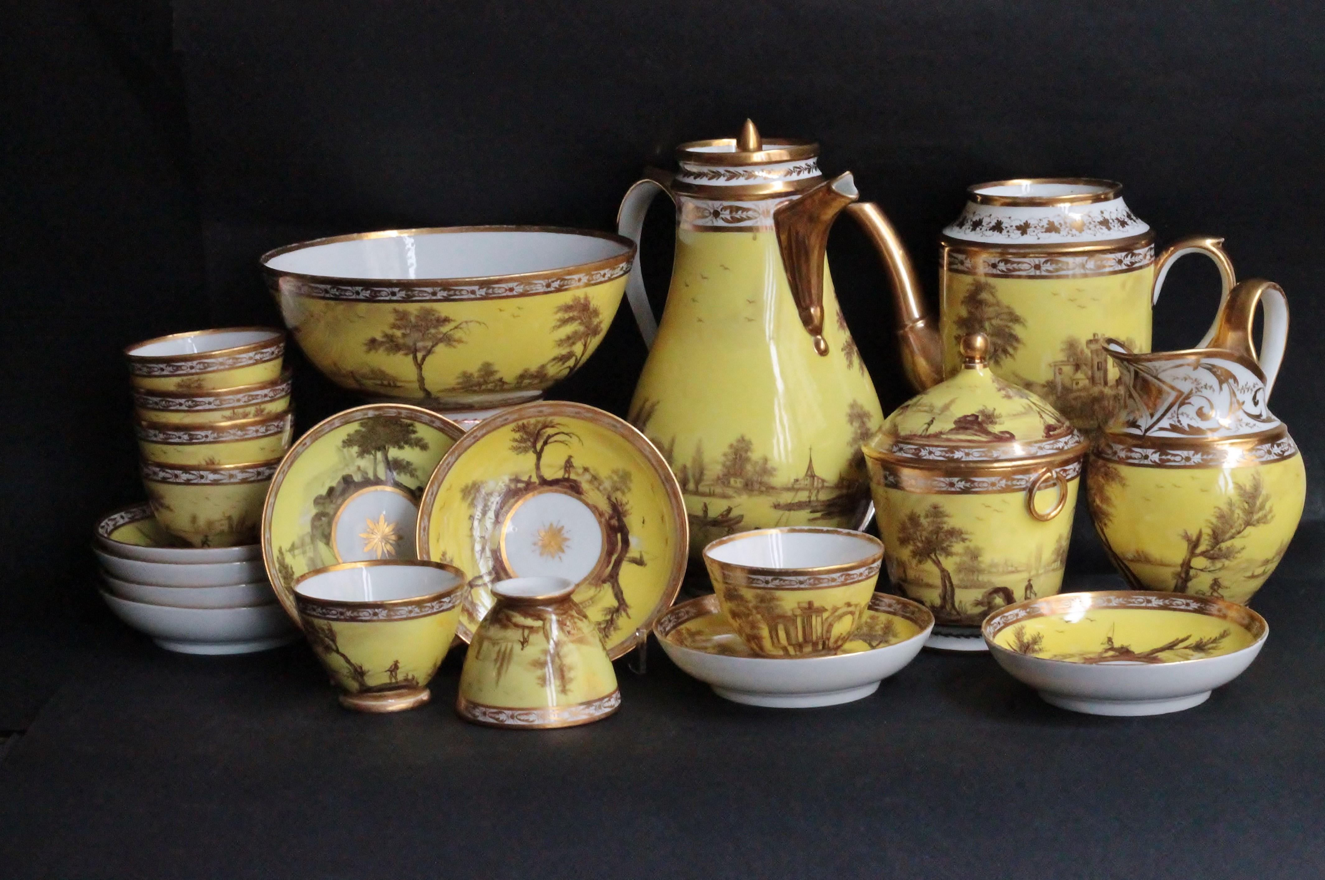 A Paris part tea and coffee service in porcelain painted with livened up landscape in sepia color on yellow background. Gilt rim. It includes:
A baluster coffee-pot and cover
A teapot without cover
A milk-jug
A circular sugar-pot and cover
A