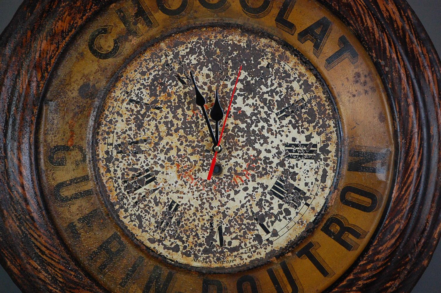 Original Chocolat Guerin Boutron advertising clock, wonderful patination, leaving the clock face highly distressed. Updated with a modern quartz movement.
