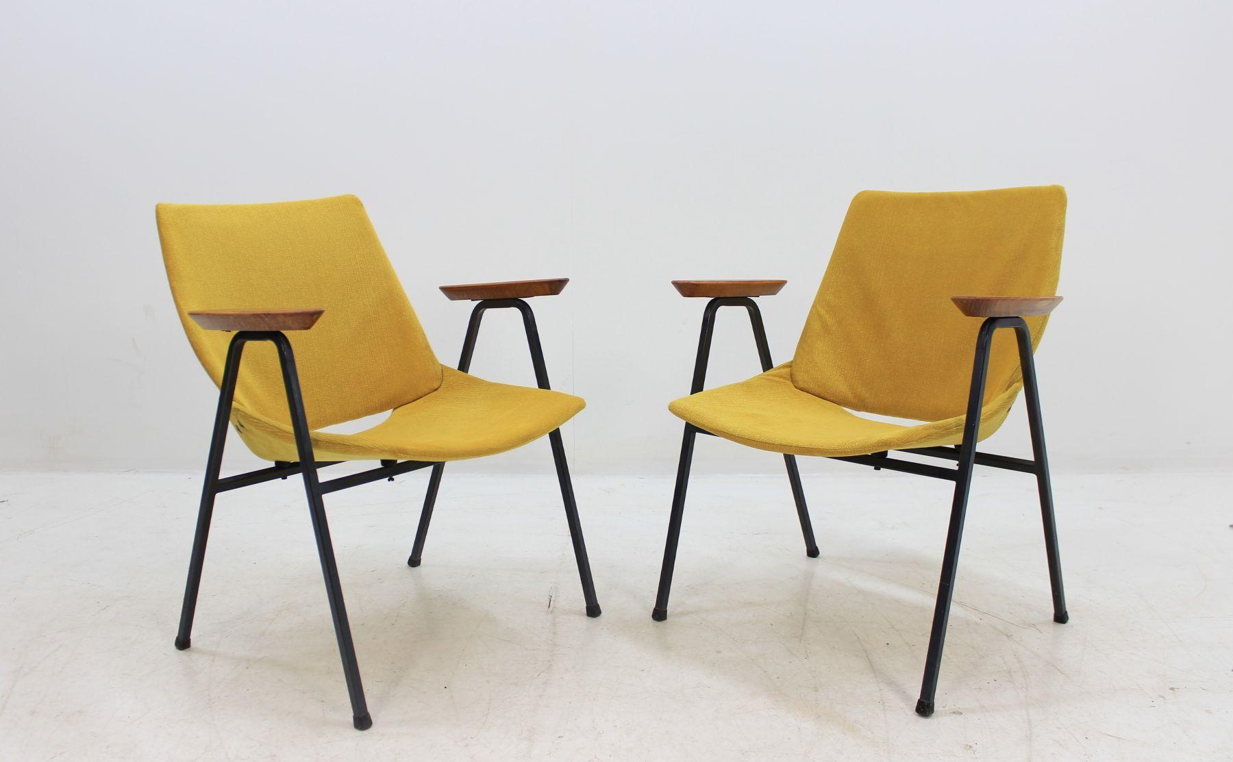 Pair of midcentury armchairs lupine shell. Design yellow chairs. Very comfortable.