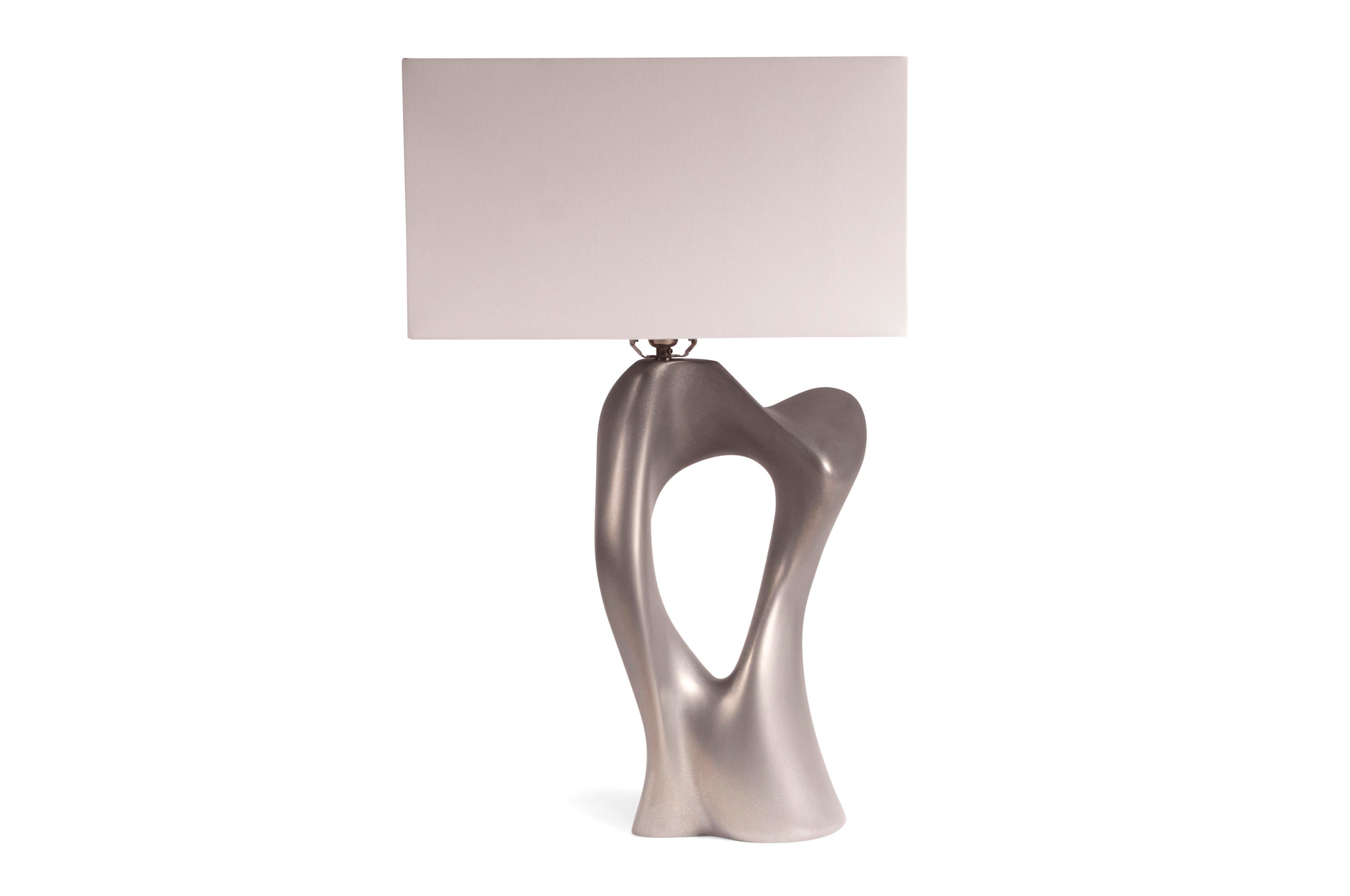 Vesta table lamp, stainless steel finish. Base dimensions: 11