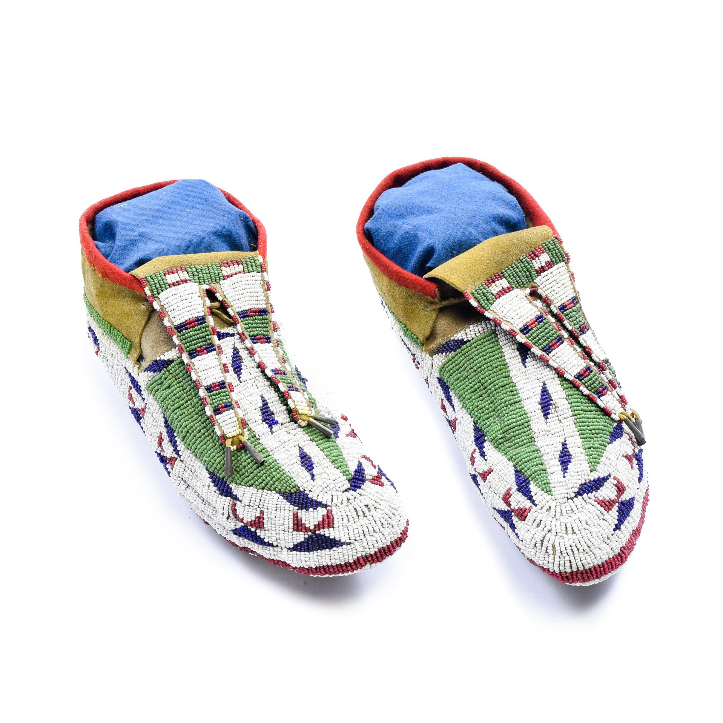 Sioux Ceremonial moccasins, with fully beaded soles.

Period: circa 1880

Origin: Sioux, Plains

Size: 10 1/4