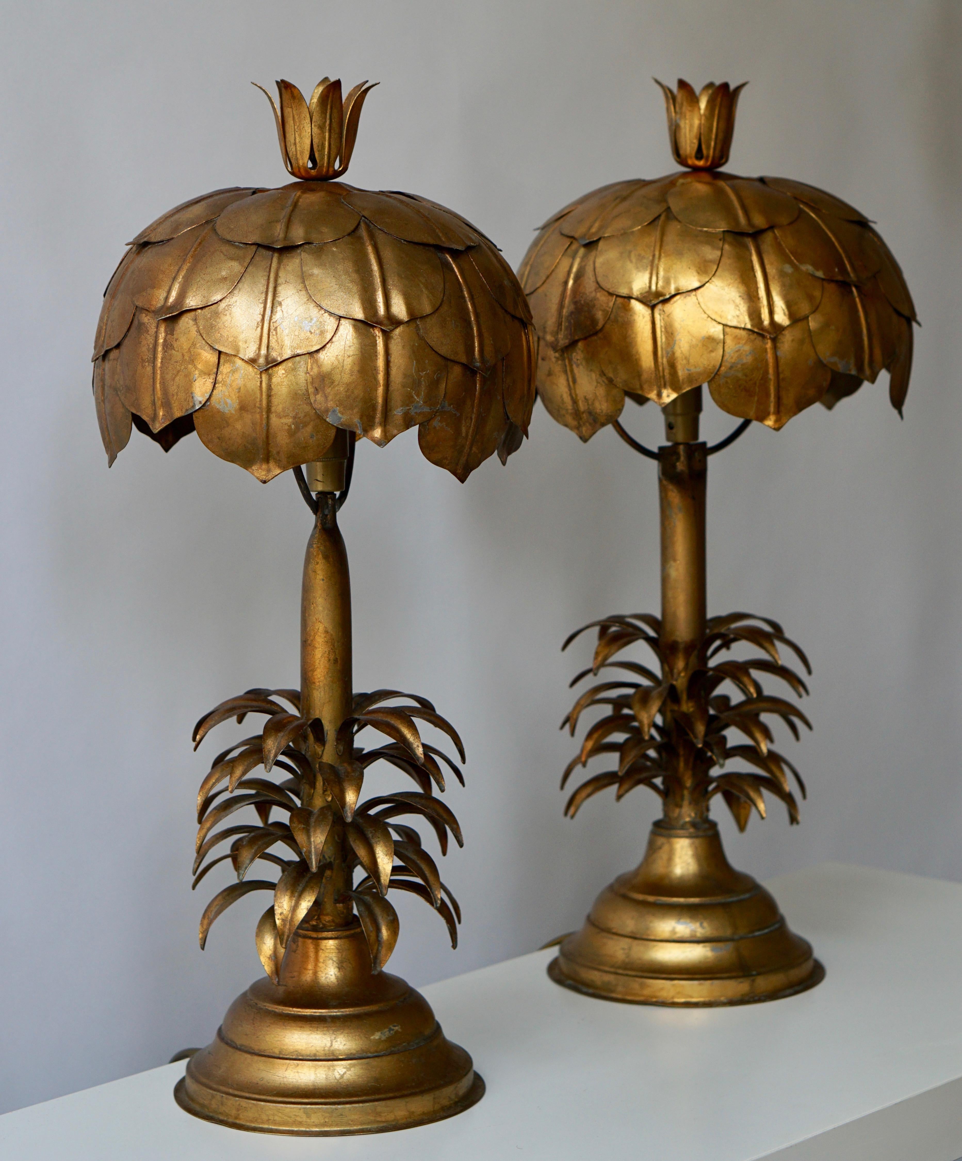 Two stunning gilt metal palm tree lamps, circa 1970s.
A few of the leaves have slight bends at points, some of the gilt shows signs of wear which is consistent with its age.
Please note that price is per item not for the set.
Measures:
Height 59