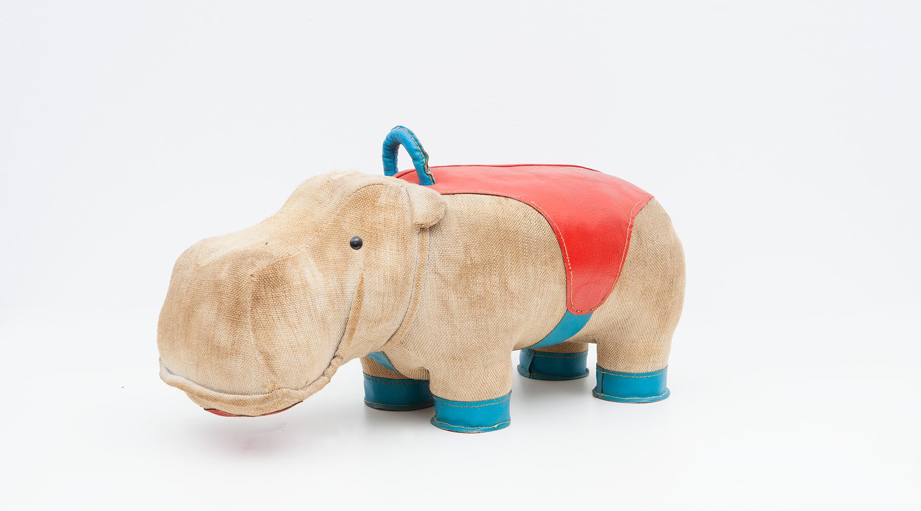 Hippo, children toy in jute and leather by Renate Müller, Germany, 1970.

Authentic animal toy from the 1970s by Renate Müller. Unique in shape and workmanship. This example shows a hippo made of jute and leather details in red and blue. High