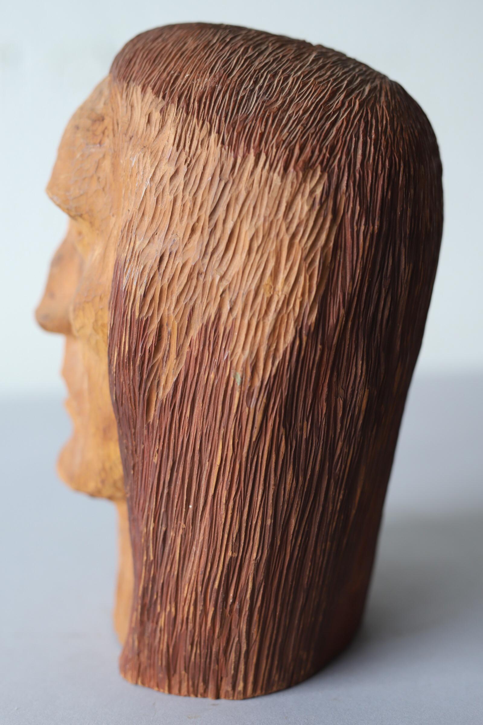 carved wooden head