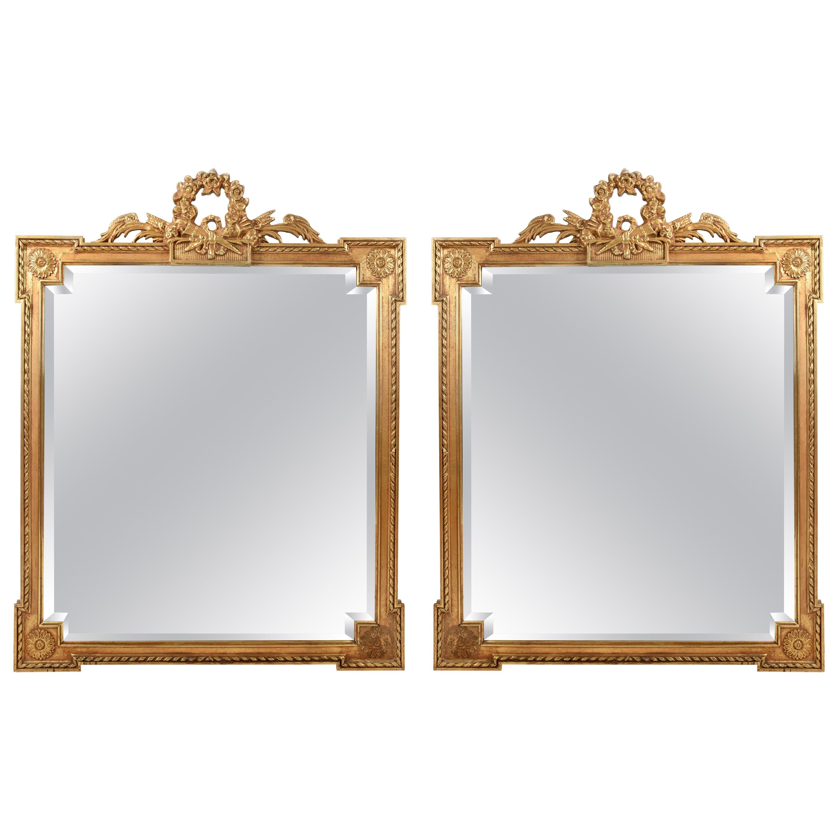 Early 20th Century Matching Pair of Giltwood Hanging Beveled Mirrors