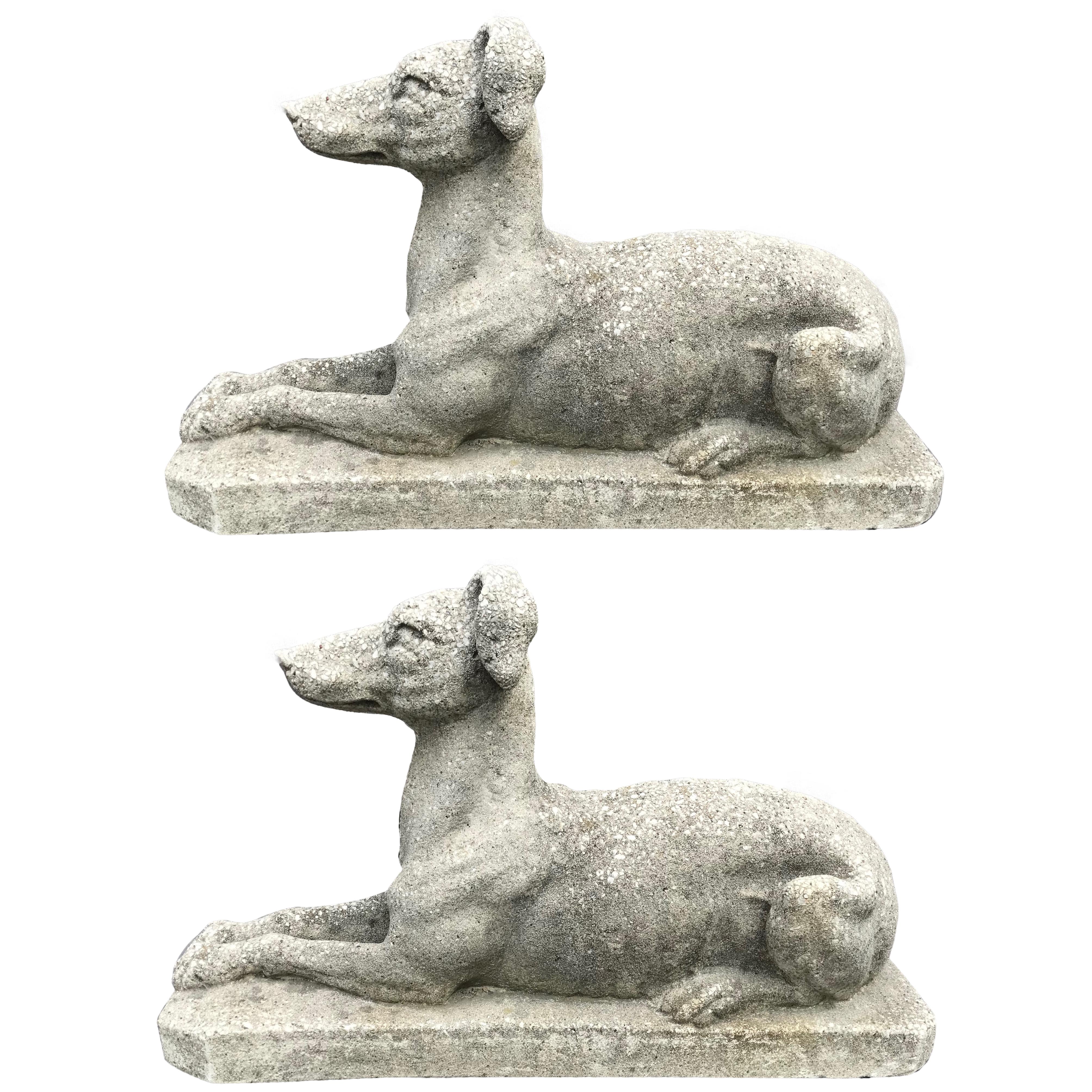 Pair stone greyhound dogs. Pair of vintage whippet/greyhound cast stone garden ornaments with imbedded pebbles; dogs are depicted in guard position, perfect on either side of an entry or in a garden setting, England, circa 1930.
Dimensions: 7.5
