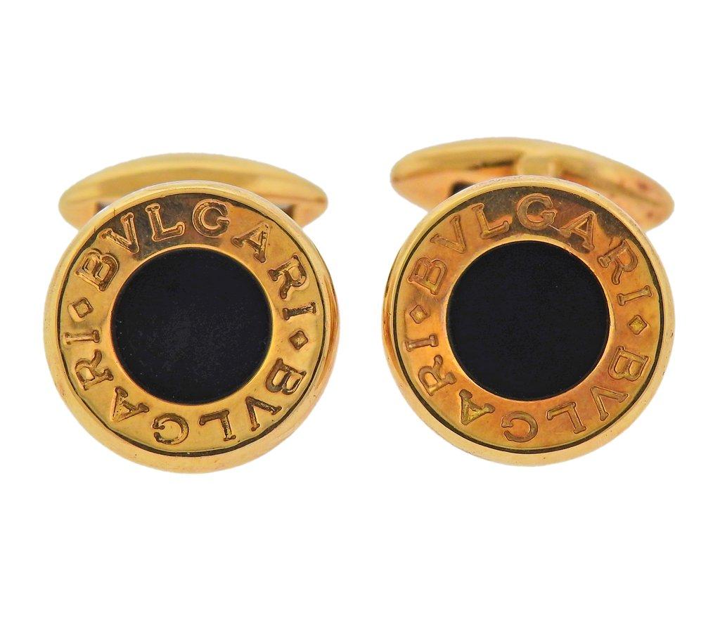 Pair of 18k gold cufflinks by Bvlgari, with onyx in the center. Cufflink top is 15mm in diameter. Marked - Bvlgari, 750, made in Italy, Italian mark. Weight - 16.2 grams. 
