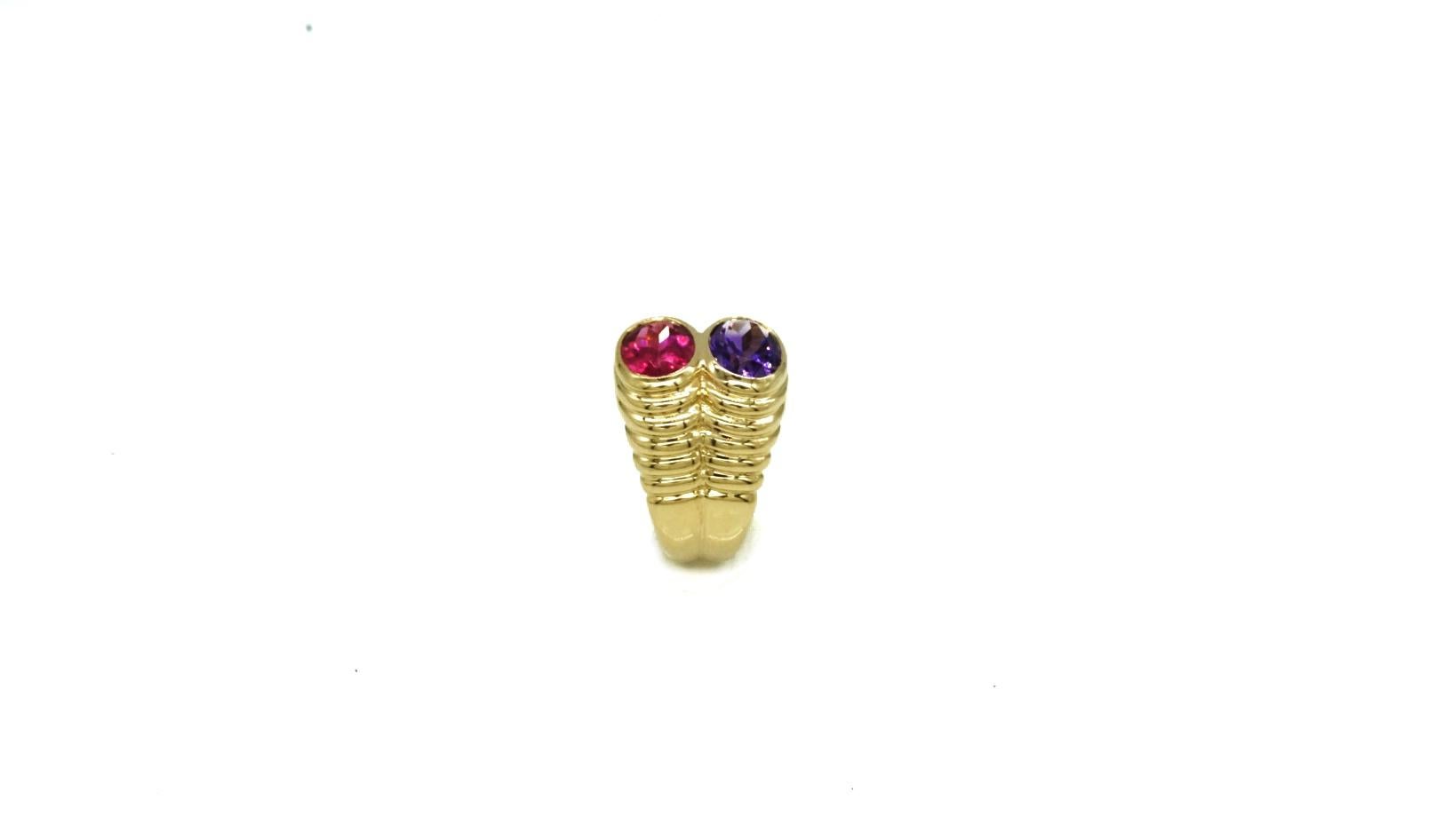 A Bulgari Amethyst and red Tourmaline Ring mounted on 18k Yellow Gold. Made in Italy, circa 1980
