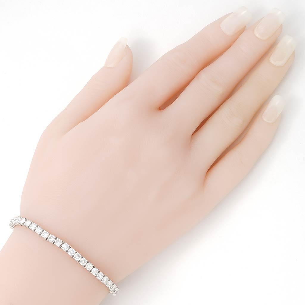  The bracelet is 7 inches in length, made of 950 platinum, and weighs 12.4 DWT (approx. 19.28 grams). It also has 48 round F/G-color, VVS/VS-clarity diamonds weighing 9.00 CTTW. Professionally Cleaned and polished with original box.