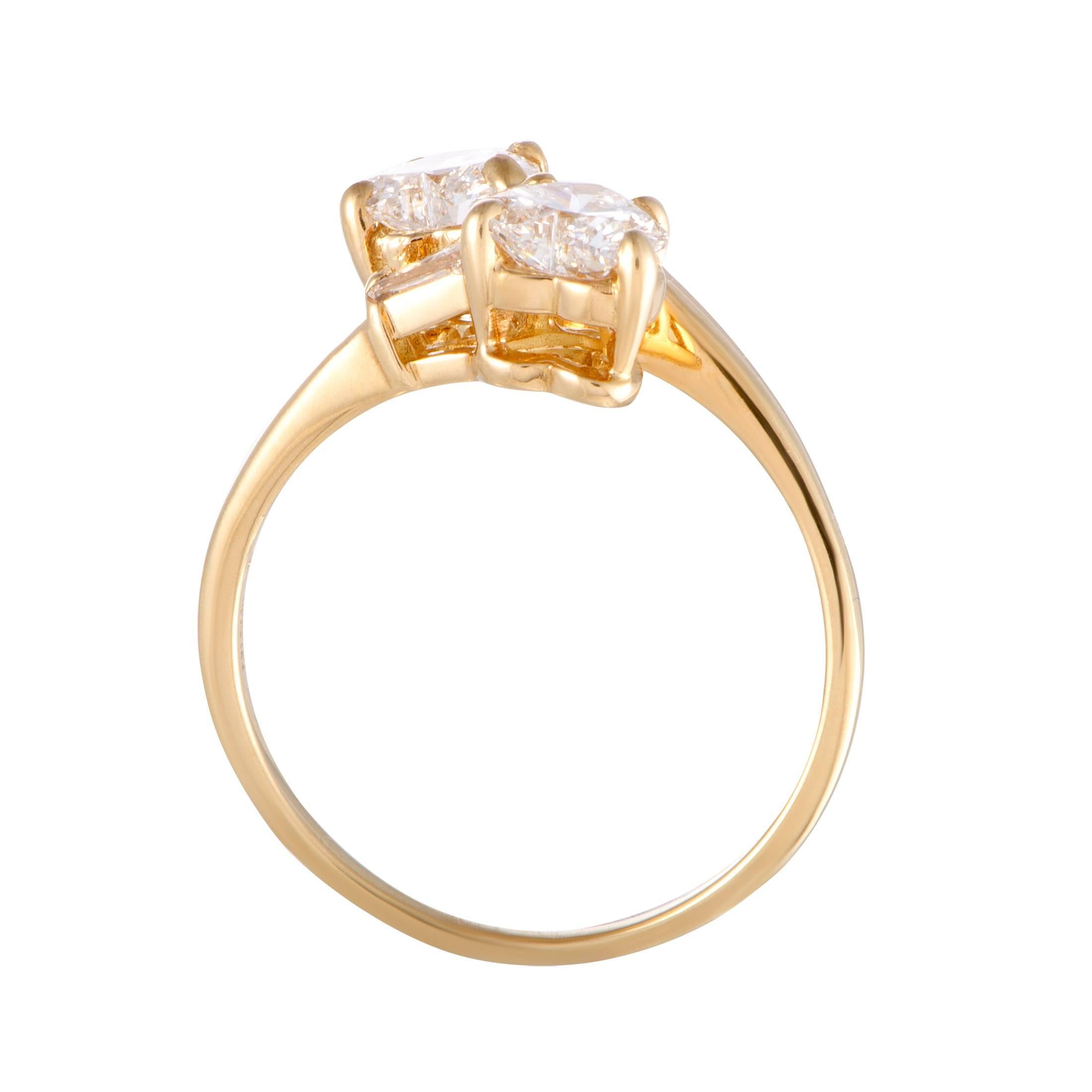 Timeless beauty and elegance are embodied in this sublime ring presented by Bulgari that features an exceptionally prestigious design and endearing diamond décor. The ring is made of radiant 18K yellow gold and set with a total of approximately 1.10