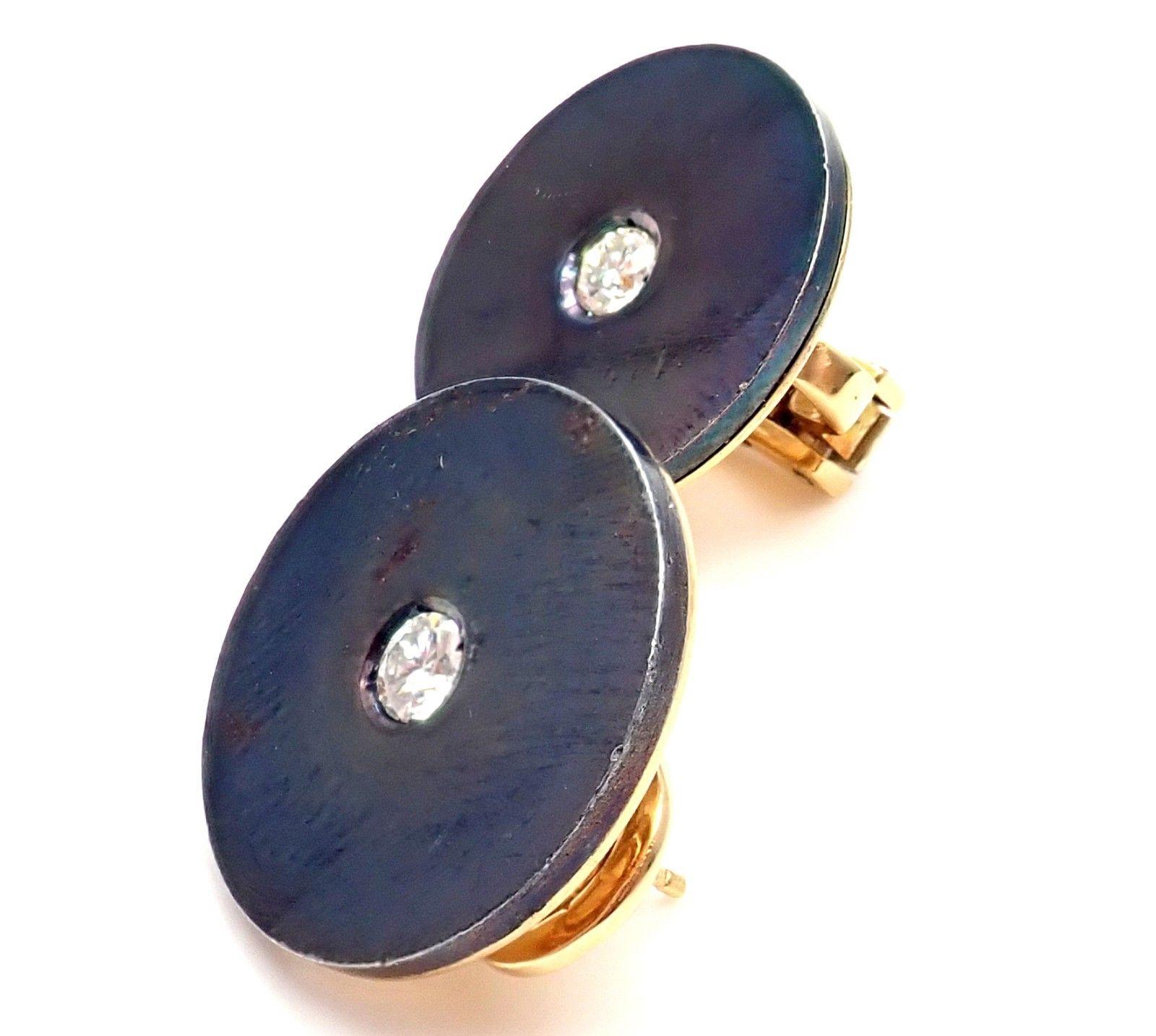 18k Yellow Gold Diamond Hematite Earrings by Bulgari. 
With 2 round brilliant cut diamonds VS1 clarity, G color total weight approx. .40ct
These earrings are made for pierced ears.
Details: 
Measurements: 19mm
Weight: 14.1 grams
Stamped Hallmarks: