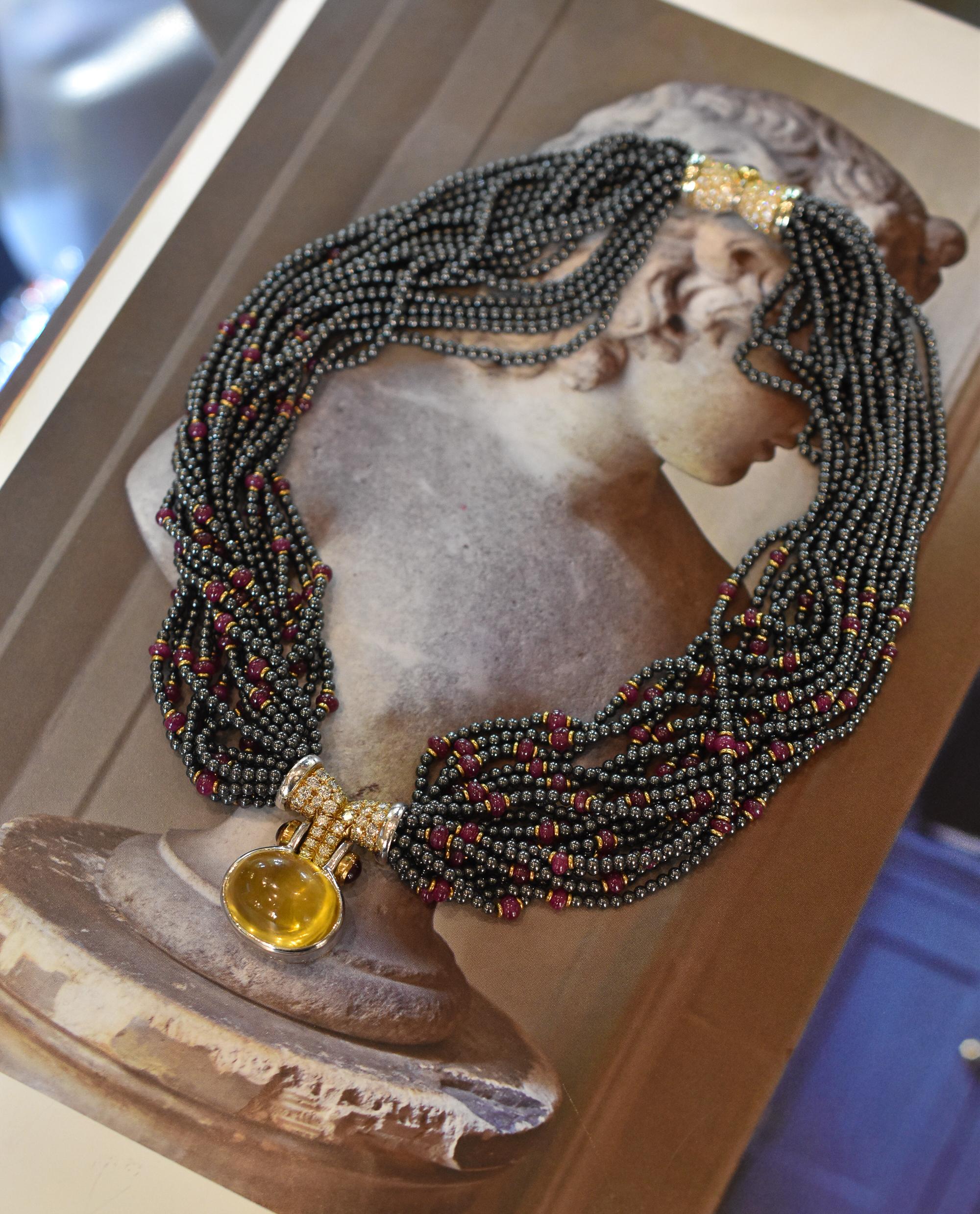 Bulgari Hematite, Ruby and Diamond Torsade Necklace with a 43ct Yellow Sapphire In Excellent Condition For Sale In New York, NY