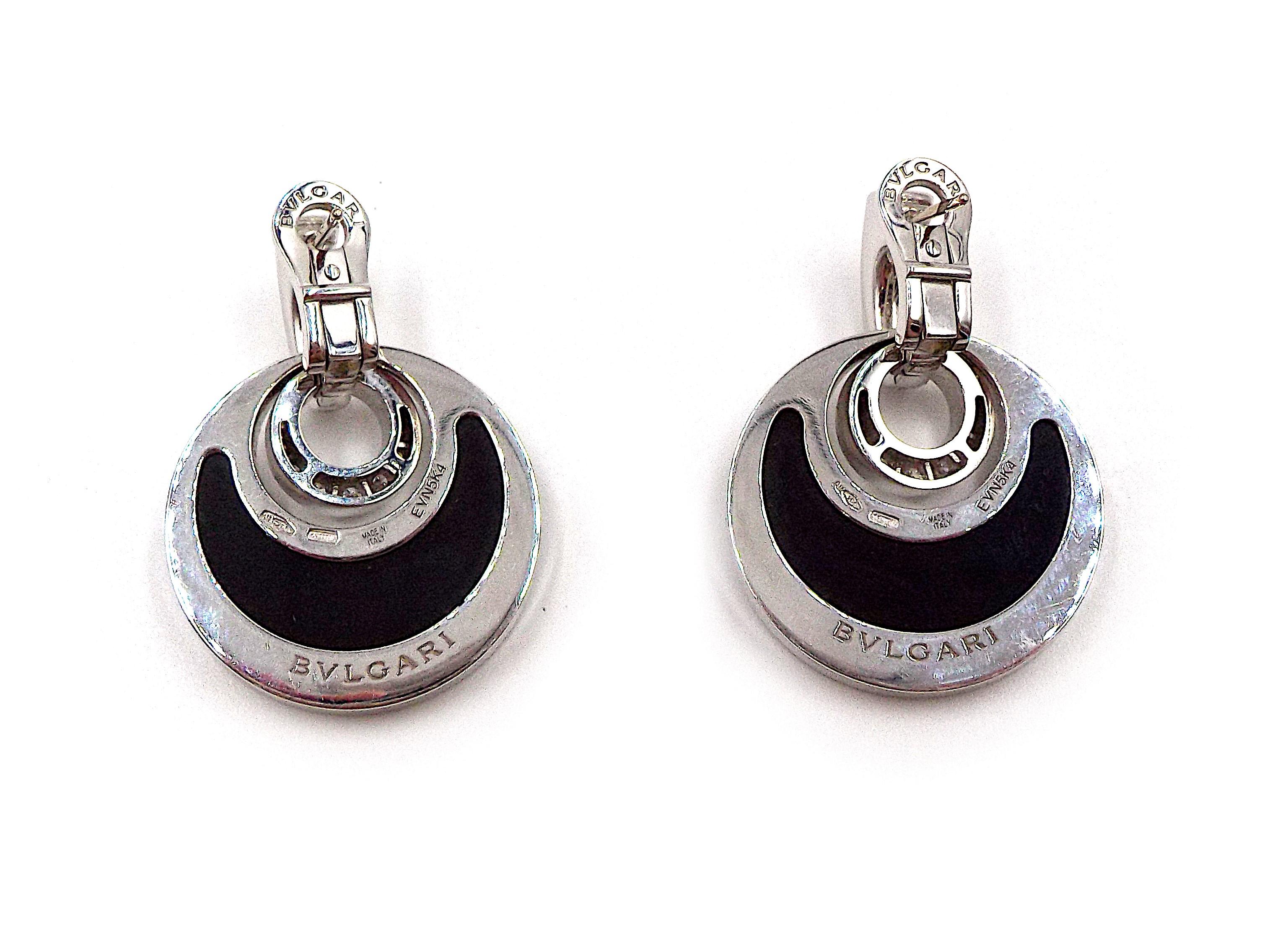 A pair of chic Bulgari earrings from the Intarsio collection. Made of 18K white gold, with onyx plaques, set with round diamonds. Each earring weighs 14.8 grams, dimensions approximately 1.5