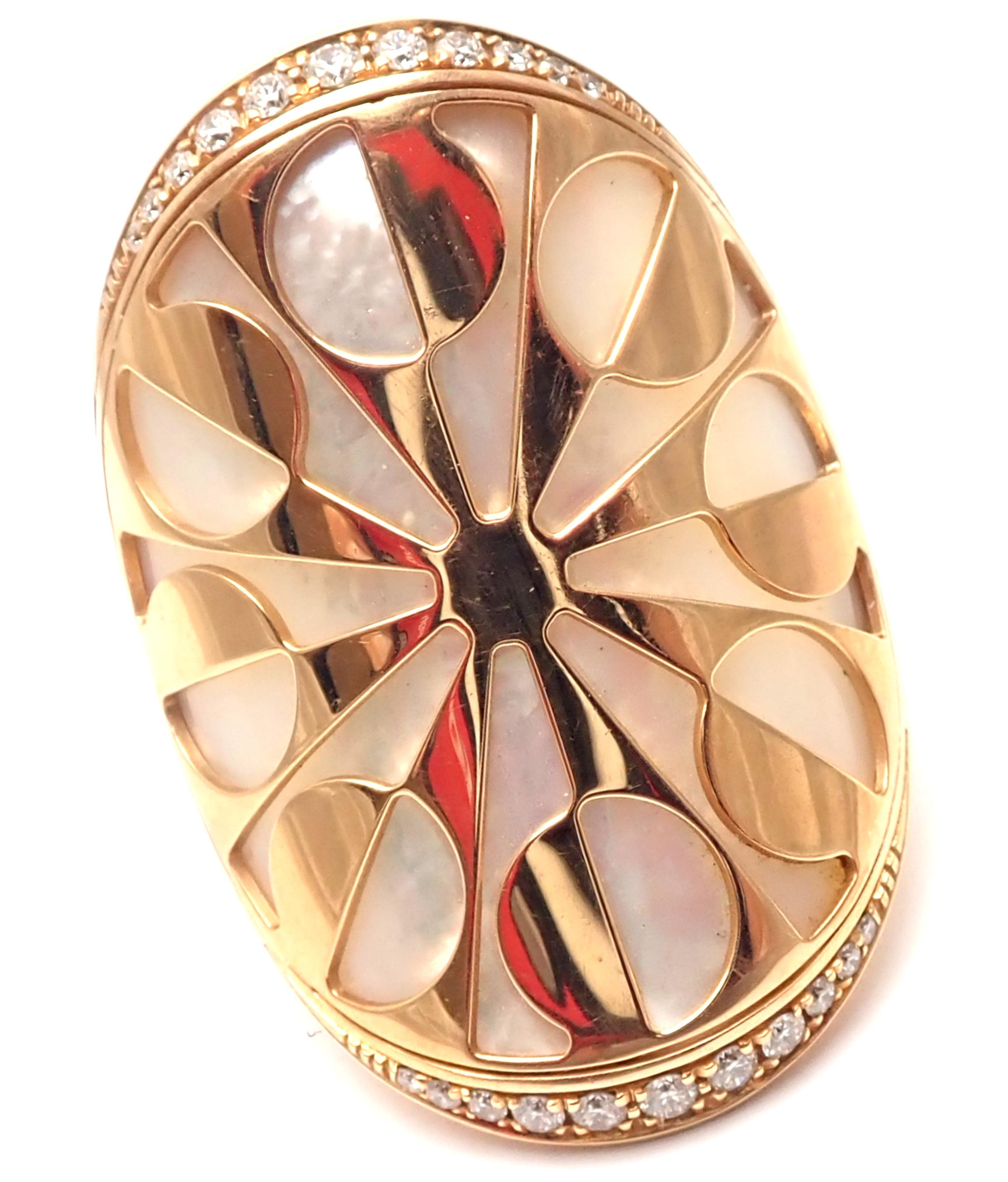 18k Rose Gold Diamond Mother Of Pearl Intarsio Ring by Bulgari.  
With 22 round brilliant cut diamonds VS1 clarity E color total weight approx. .25ct
Details: European 53, US 6 1/4
Width: 31mm
Weight: 14.2 grams
Stamped Hallmarks: Bulgari, 750, 53,