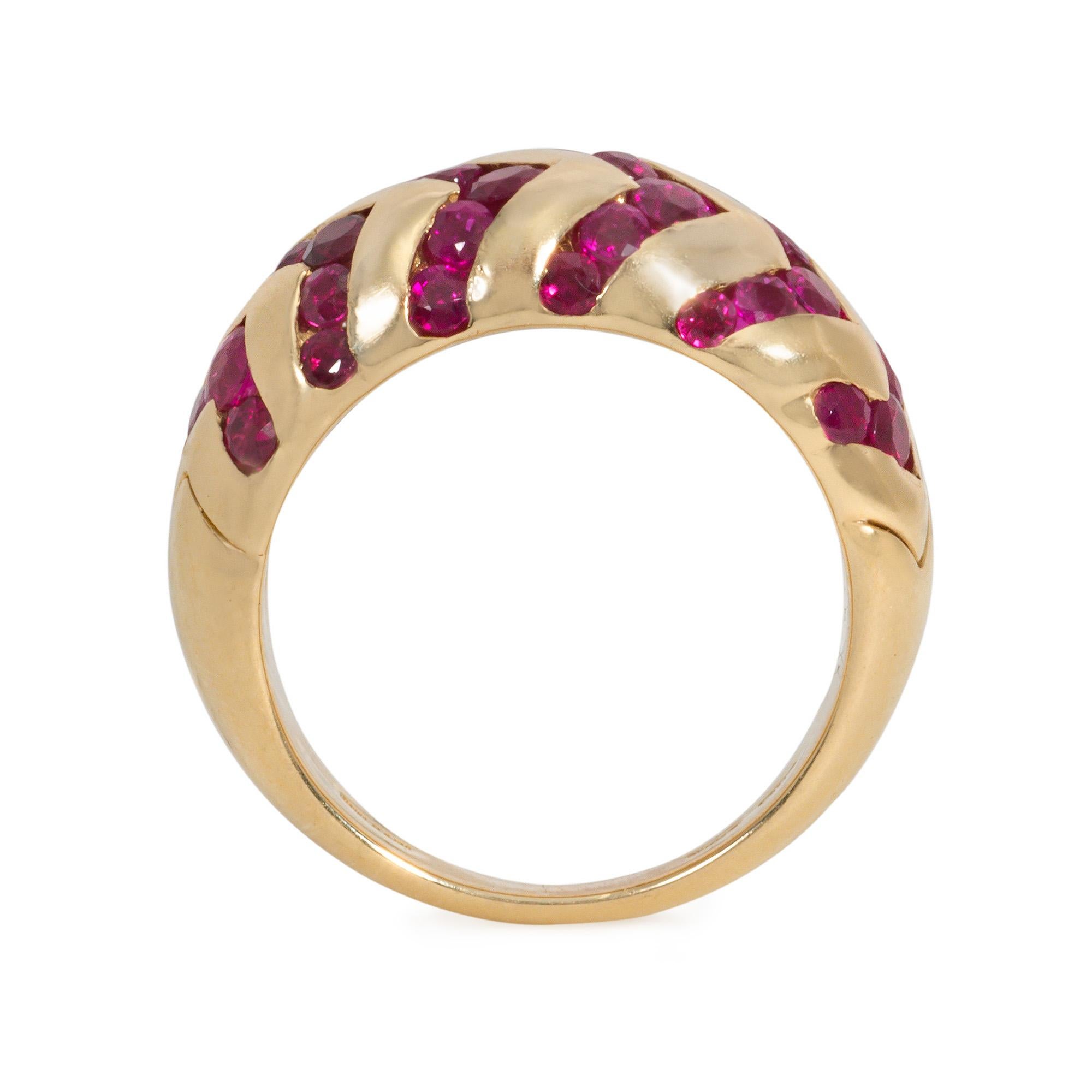An estate gold and ruby ring of bombé, band style design, with the rubies channel- set in a zig zag, zebra stripe pattern, in 18k.  Bulgari, Italy.  Minor re-sizing is possible; please contact us with any inquiries.

* Includes letter of