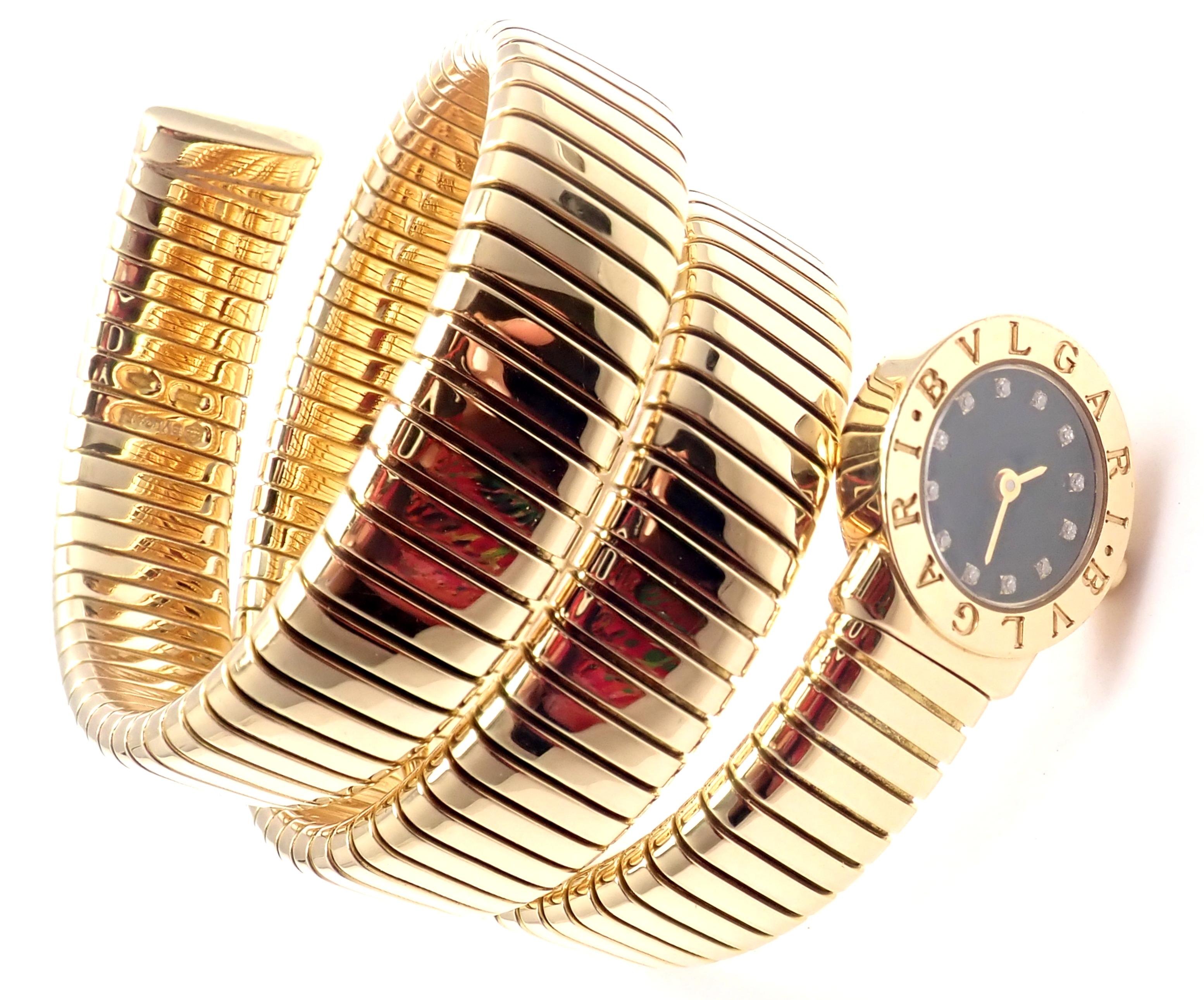 Bulgari lady's 18k yellow gold Diamond Tubogas Serpent Snake bracelet watch. 
With 12 Round brilliant cut diamonds VVS1 clarity E color
Details:
Model: BB191T
Movement Type: Quartz
Case Size: 3/4