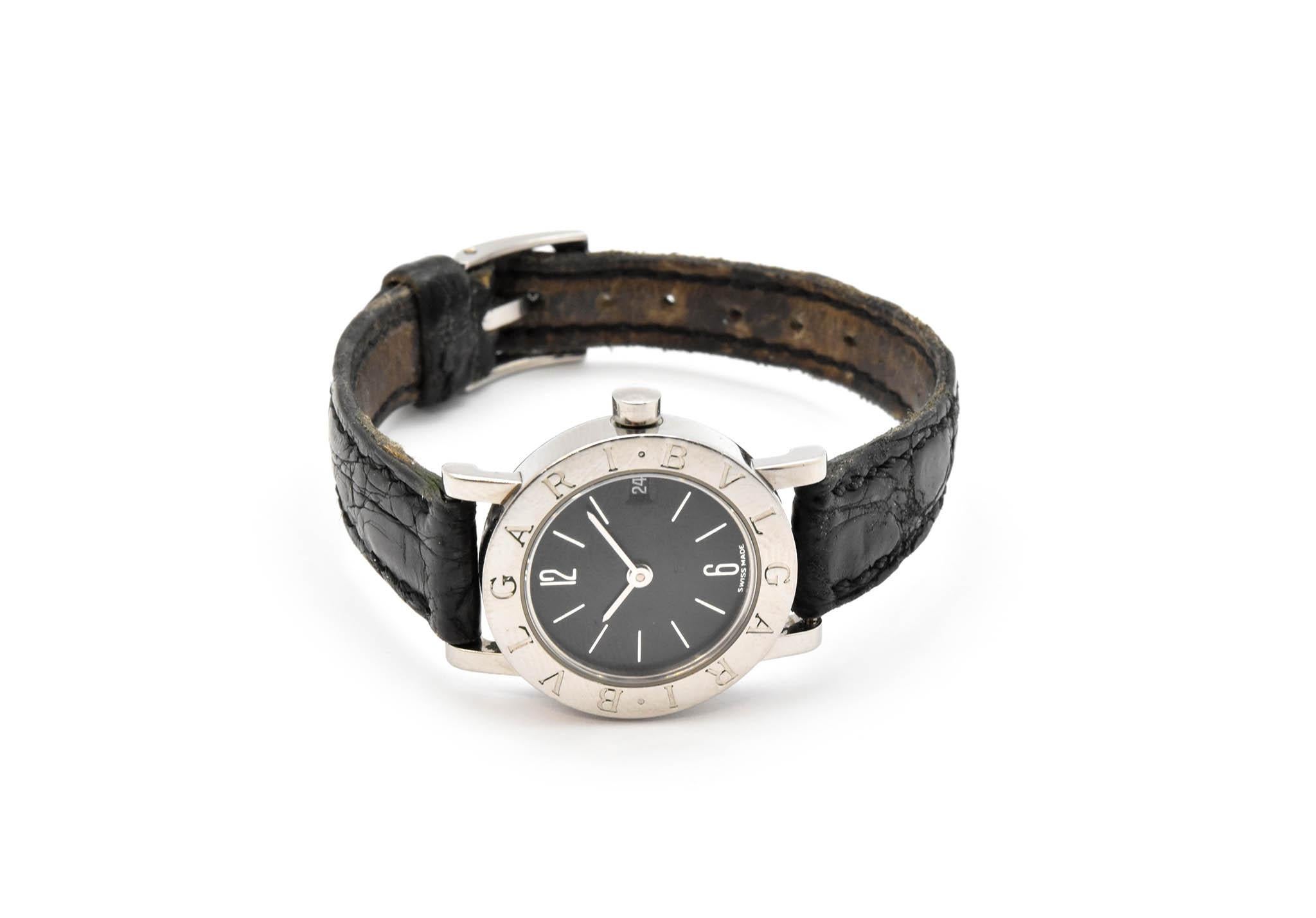 Movement: quartz
Function: hours, minutes
Case: 23mm stainless steel case, sapphire crystal
Band: *worn* original Bulgari black leather strap with steel Bulgari tang buckle, fits up to a 5.75-inch wrist
Dial: black dial, silver hands and hour
