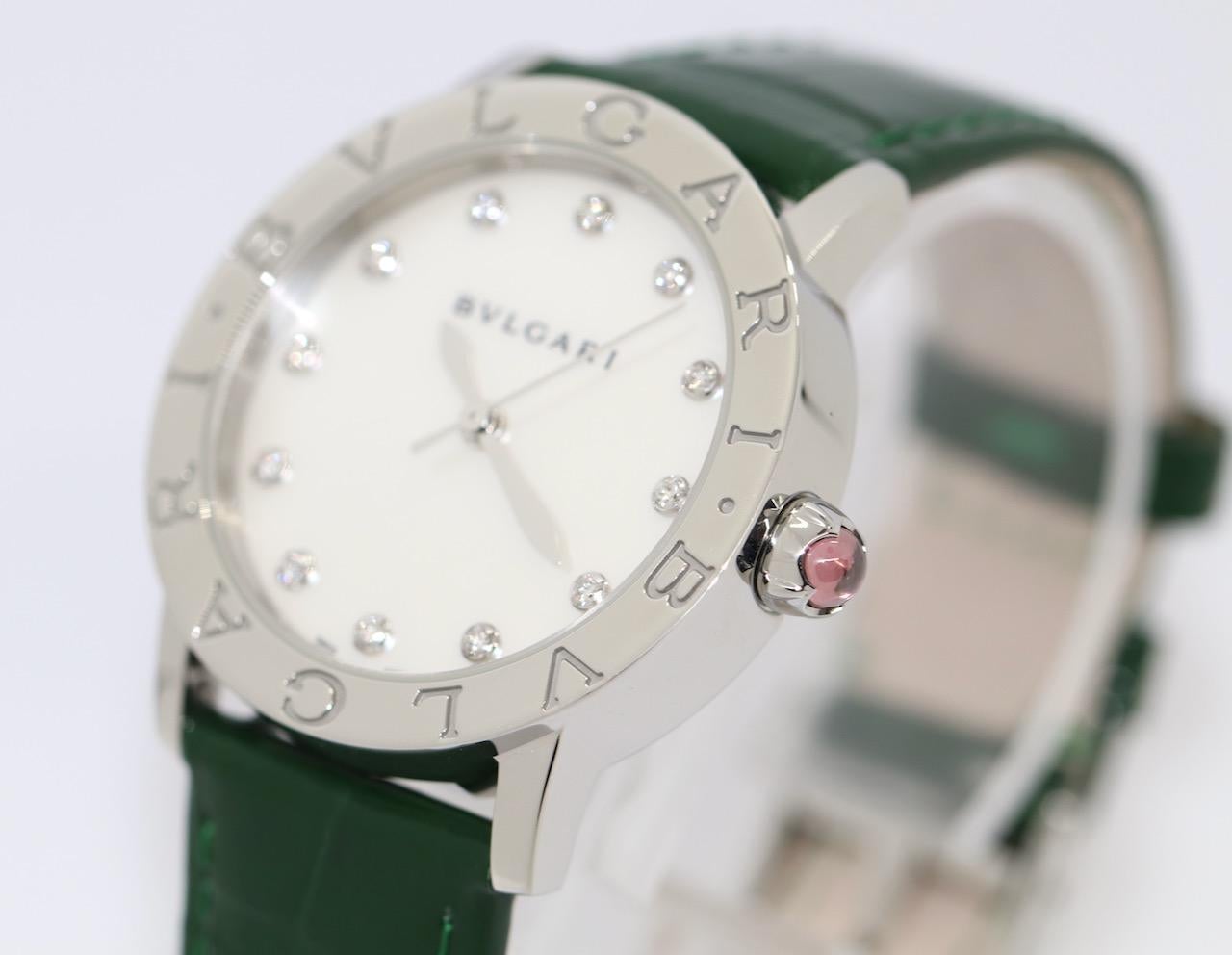 Bvlgari Ladies Wrist Watch Automatic with Diamonds and MOP Dial. Ref. BBL33S

Bulgari remaining guarantee until 09/23. With original new unworn Bulgari strap. 
From first owner. Excellent condition. Including original Box and papers.

Diameter