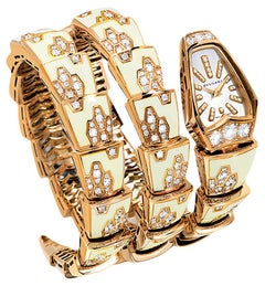 Bulgari Montre-bracelet pour femme Serpenti à quartz en or jaune avec diamants et nacre