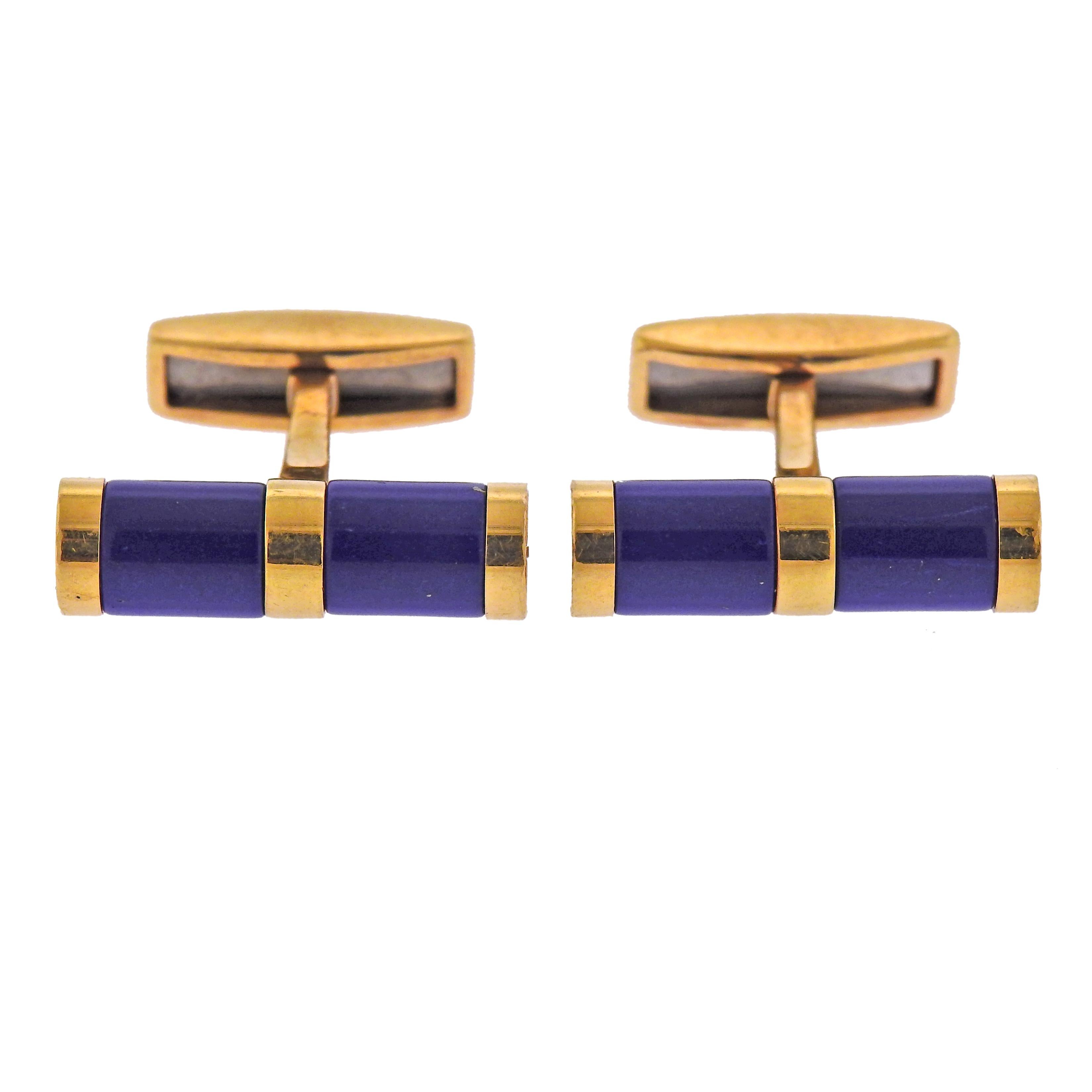 Pair of 18k gold cufflinks by Bvlgari, with lapis lazuli. Top measures 21mm x 6mm, back - 15mm x 5mm. Weight - 15.2 grams. Marked: Bvlgari, 1697AR, Italy,750.