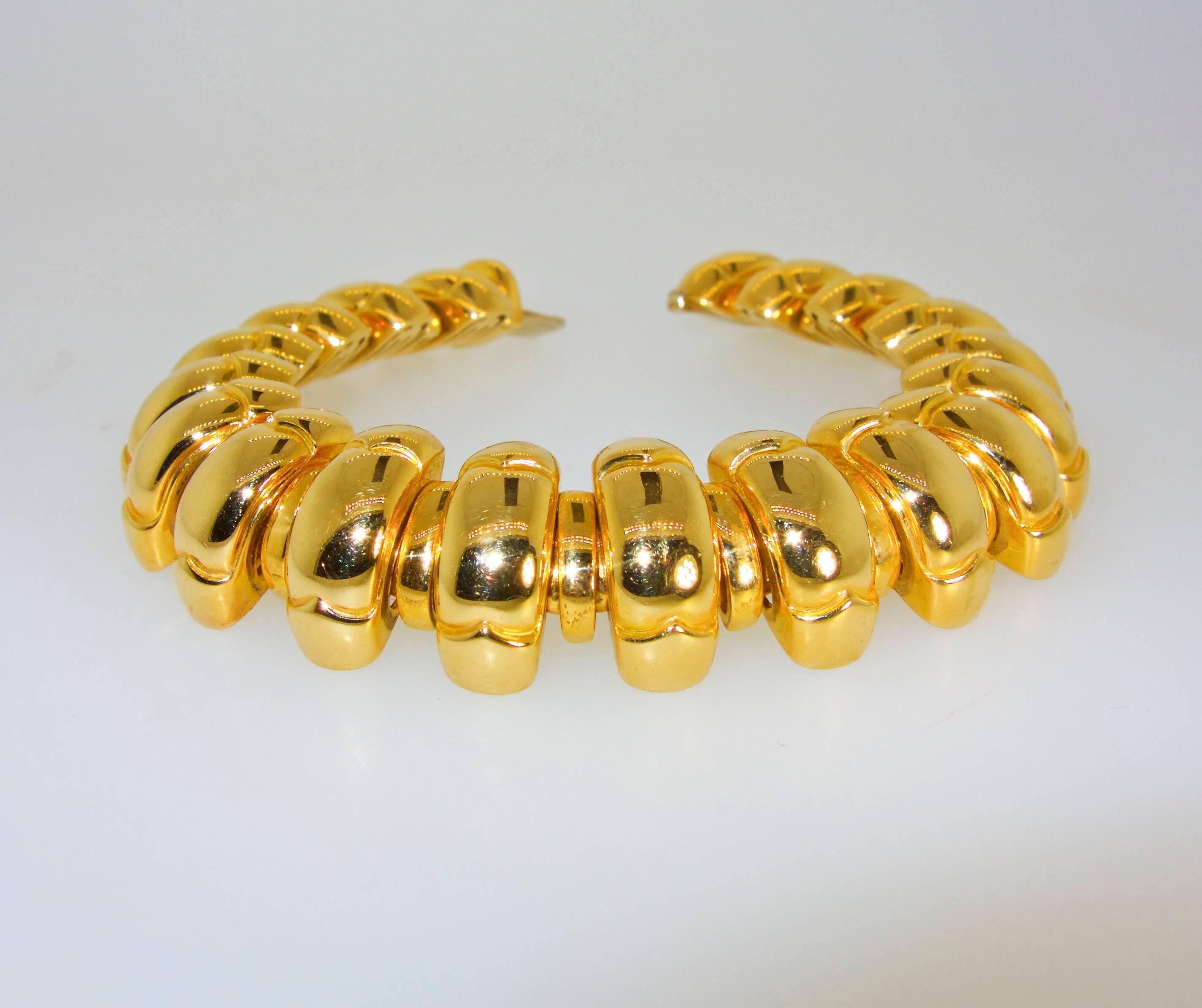 18K yellow gold, 76.52 grams.  Substantial quality, a classic link by the famous house of Bulgari.  Signed and numbered, this bracelet is 7.25 inches long