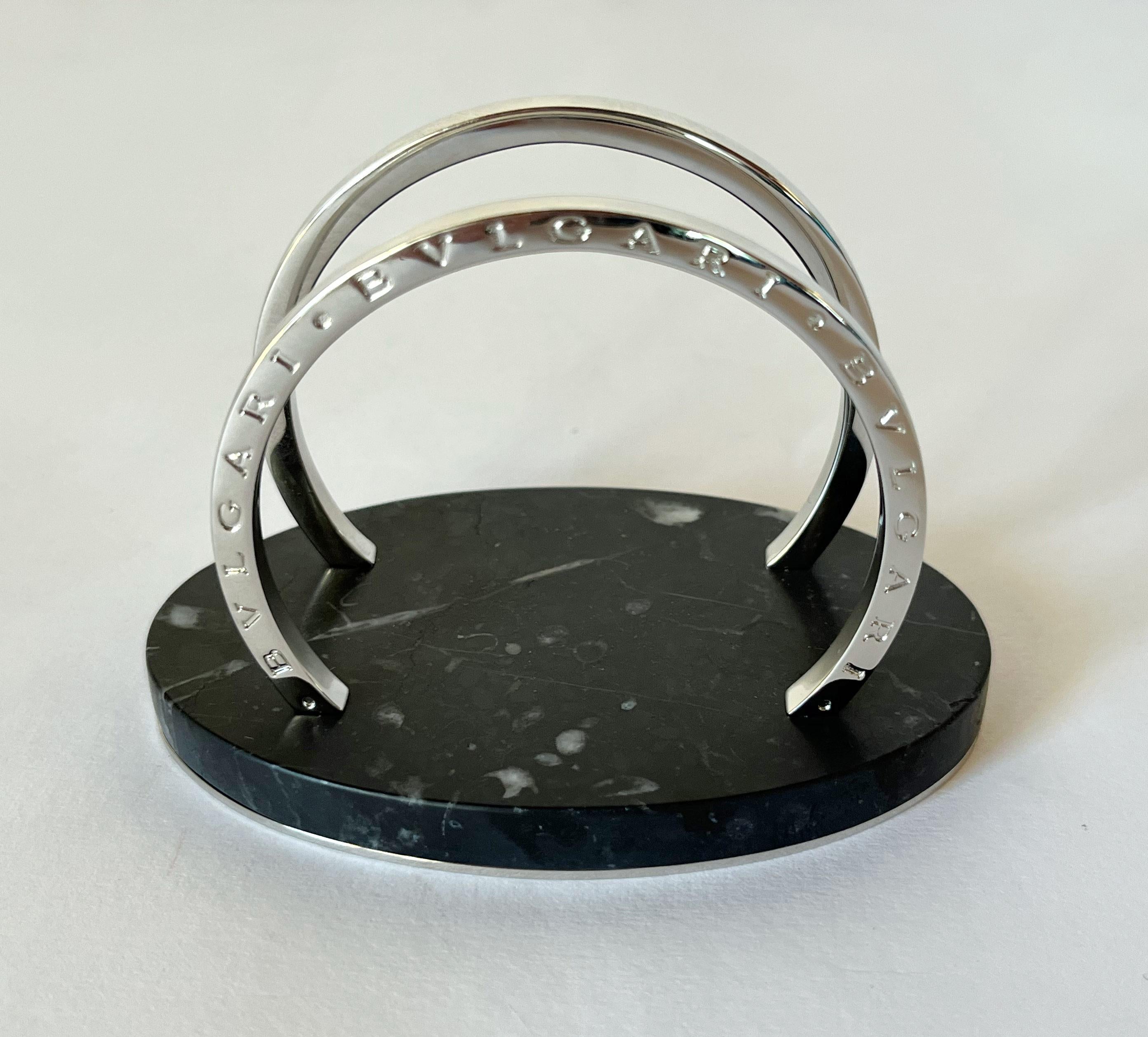 Bulgari desk letter holder with curved chrome metal arches and black marble base  / made in Italy
Original mark on the underside / comes in original box  
Width: 4 inches, depth: 2.5 inches, height: 2.5 inches
1 available in stock in Italy
Order
