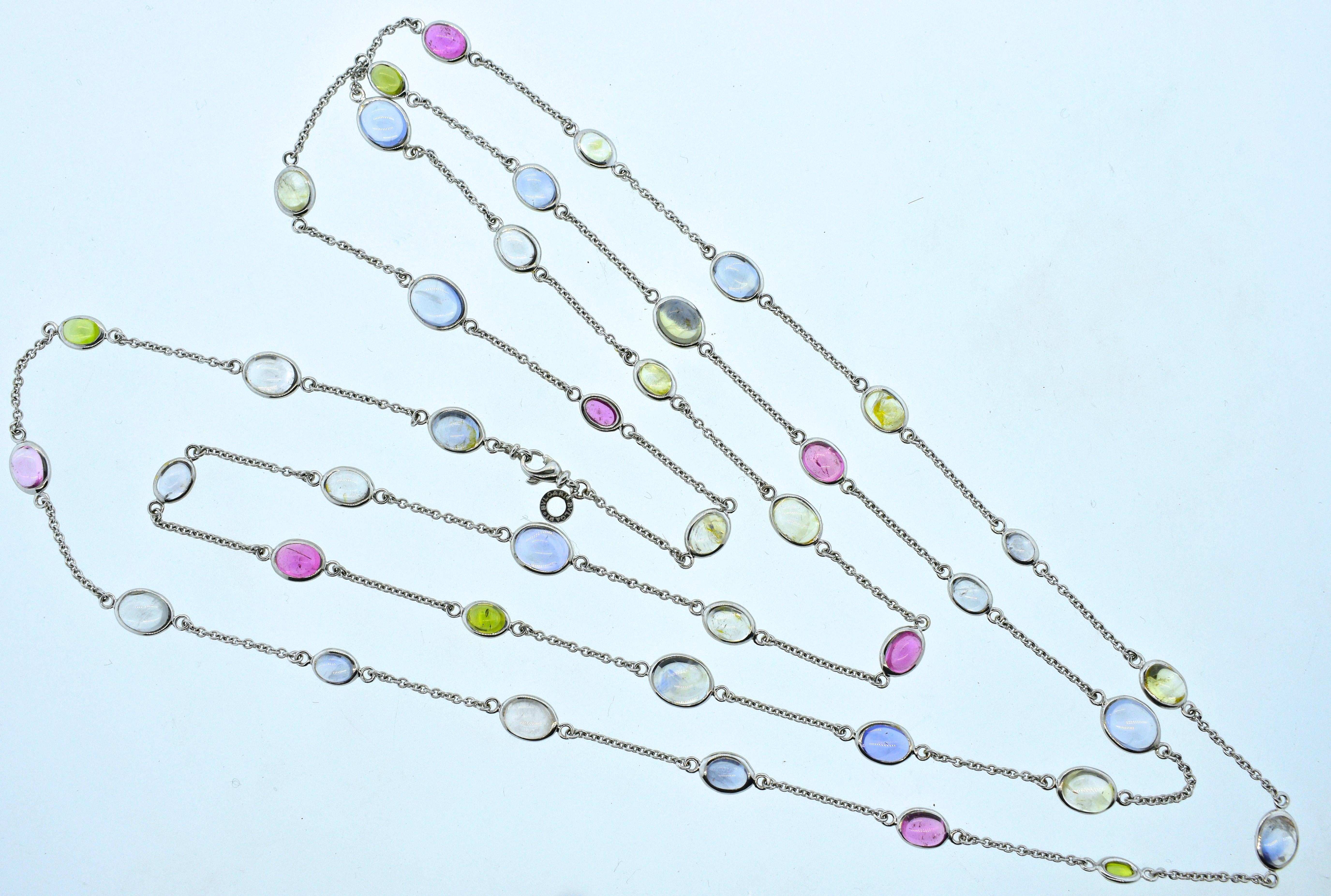 Bulgari long 18K white gold chain set with 41 sapphires of various colors, this necklace is 57 inches long and 42 grams.  This colorful necklace can be worn a variety of different lengths making this necklace quite versatile and easy to wear.  Made