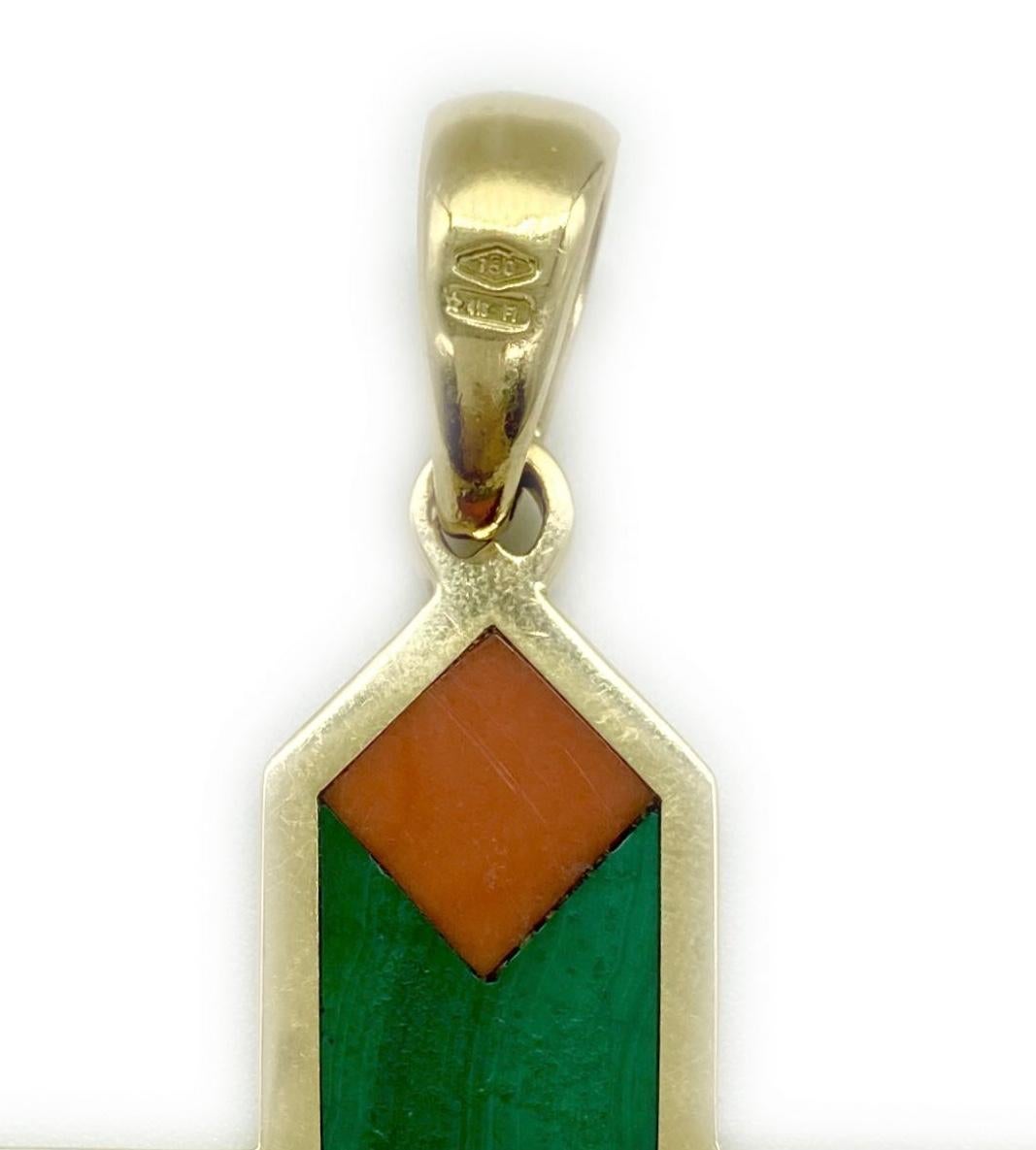Bulgari cross in 18kt yellow gold with coral and malachite, with (unsigned) yellow gold chain, circa 1970s.