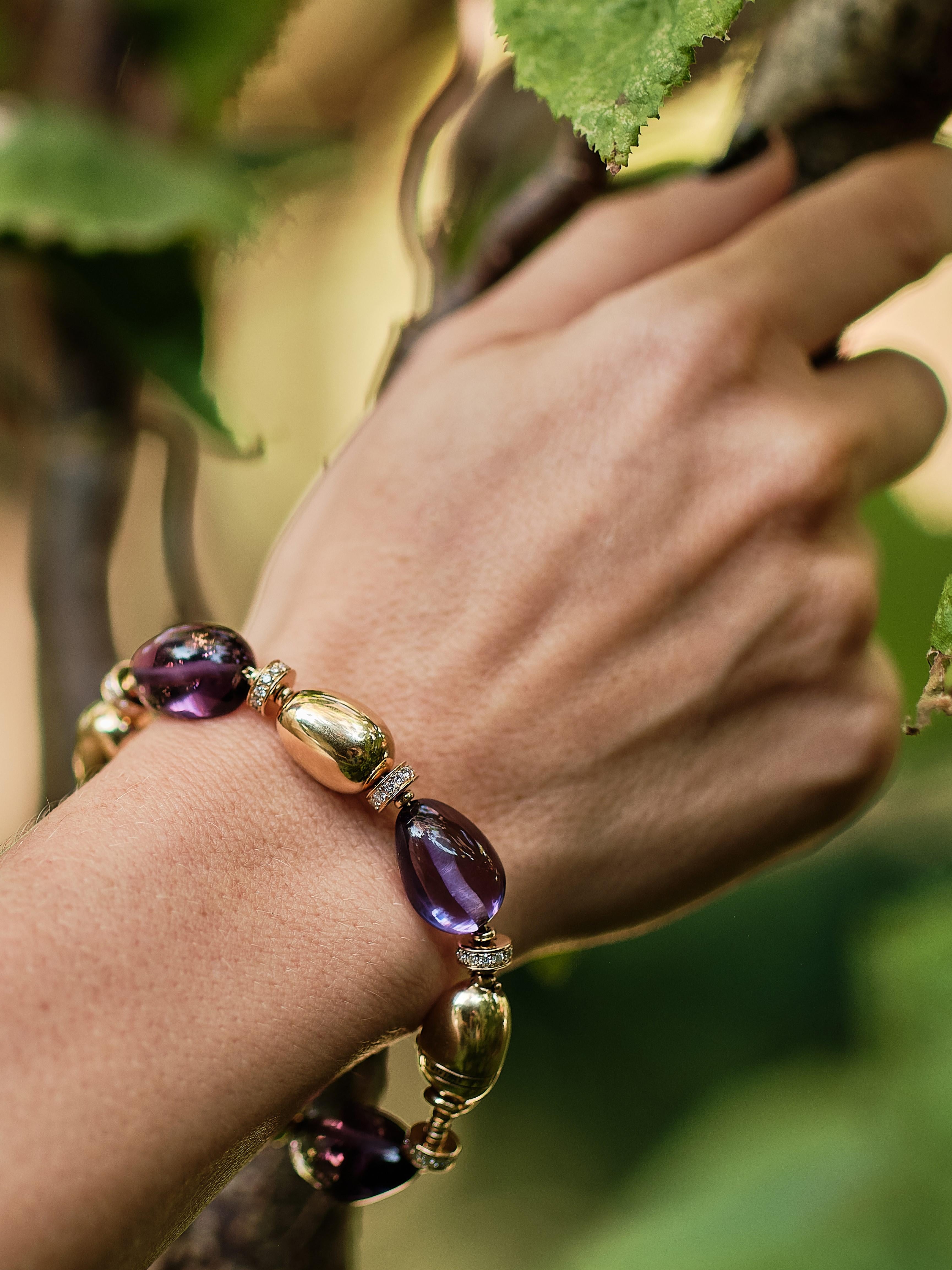 Bulgari ‘Mediterranean Eden’ amethyst, diamond and gold bracelet. 

Four polished highly translucent gorgeously saturated amethyst beads and four polished gold beads, separated by gold rondels with 12 brilliant cut diamonds each, a total of 98