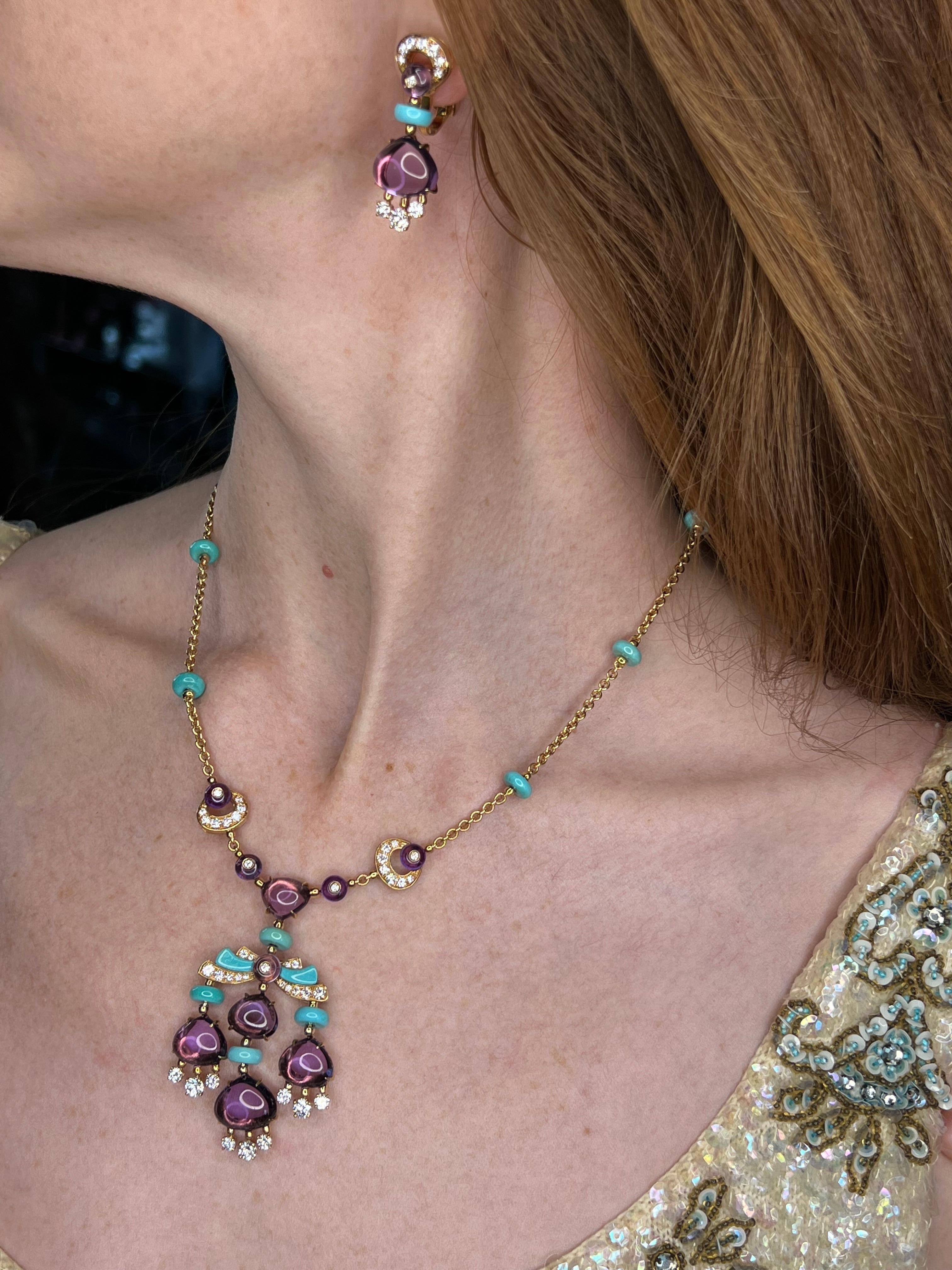 Offered here is a Bulgari Mediterranean Eden Collection Amethyst, Diamond and Turquoise necklace and earrings set in 18kt yellow gold.
Hallmarked Bulgari , manufacturing numbers,  750    Made in Italy.
Length ………………………….. Adjustable 15.5 to 17
