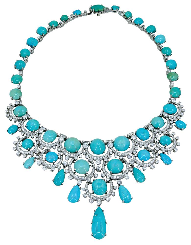Bulgari Mid-Century Turquoise Diamond Bib Suite in Platinum.

A mid-century powder blue turquoise and diamond bib necklace with matching drop earrings.

Necklace inner circumference measures approx. 15.75