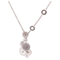 Collana con ciondolo a cerchi cinetici BULGARI Milano "Cicladi" in oro bianco 18Kt